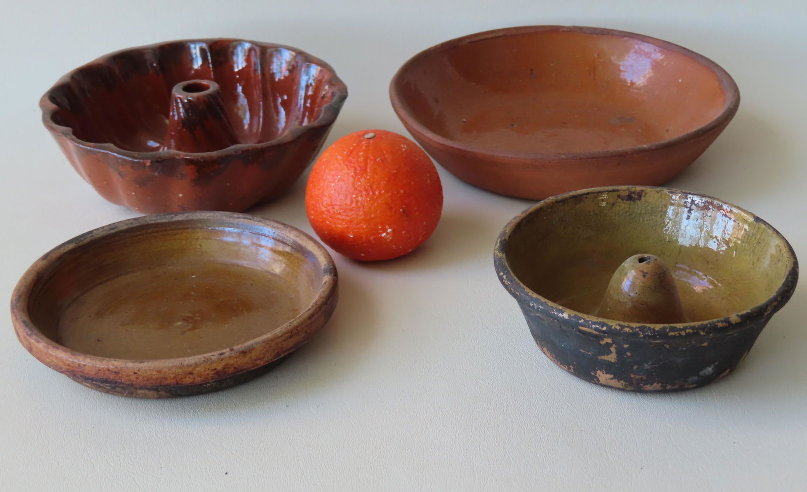 Four redware bowls and molds including: Small Bundt (1 of 7)