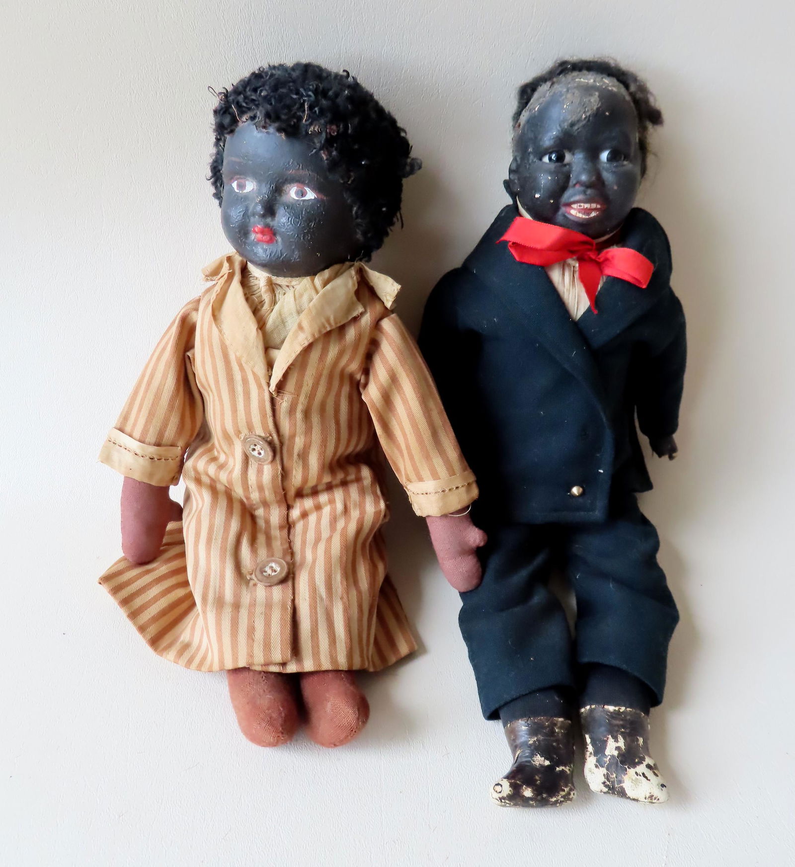 Two folk art Black dolls, male and female.  Male with (1 of 5)
