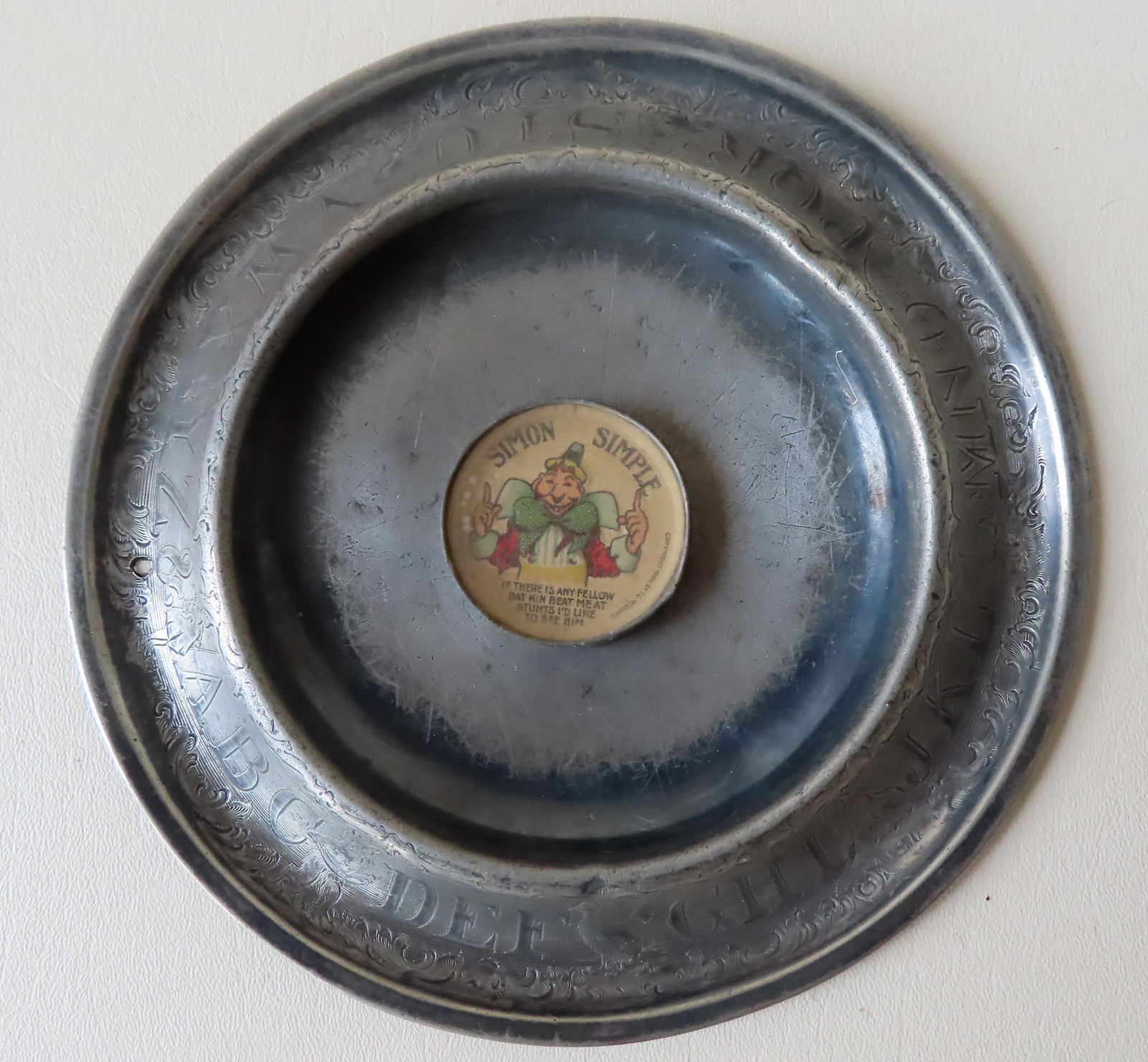 A child's silver alphabet plate marked on base THE VAN (1 of 6)