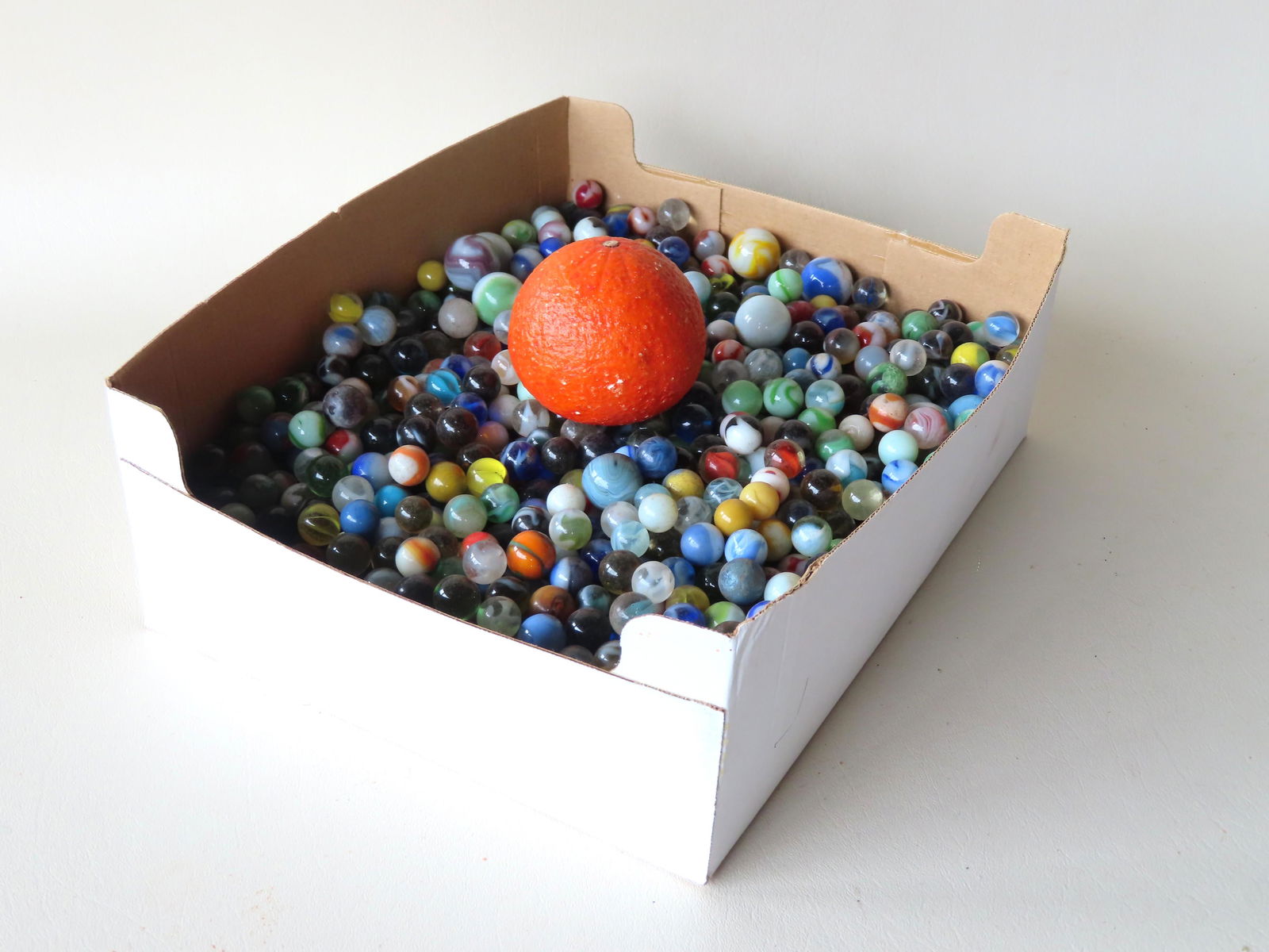 A large grouping of over 1200 vintage marbles, most in (1 of 4)