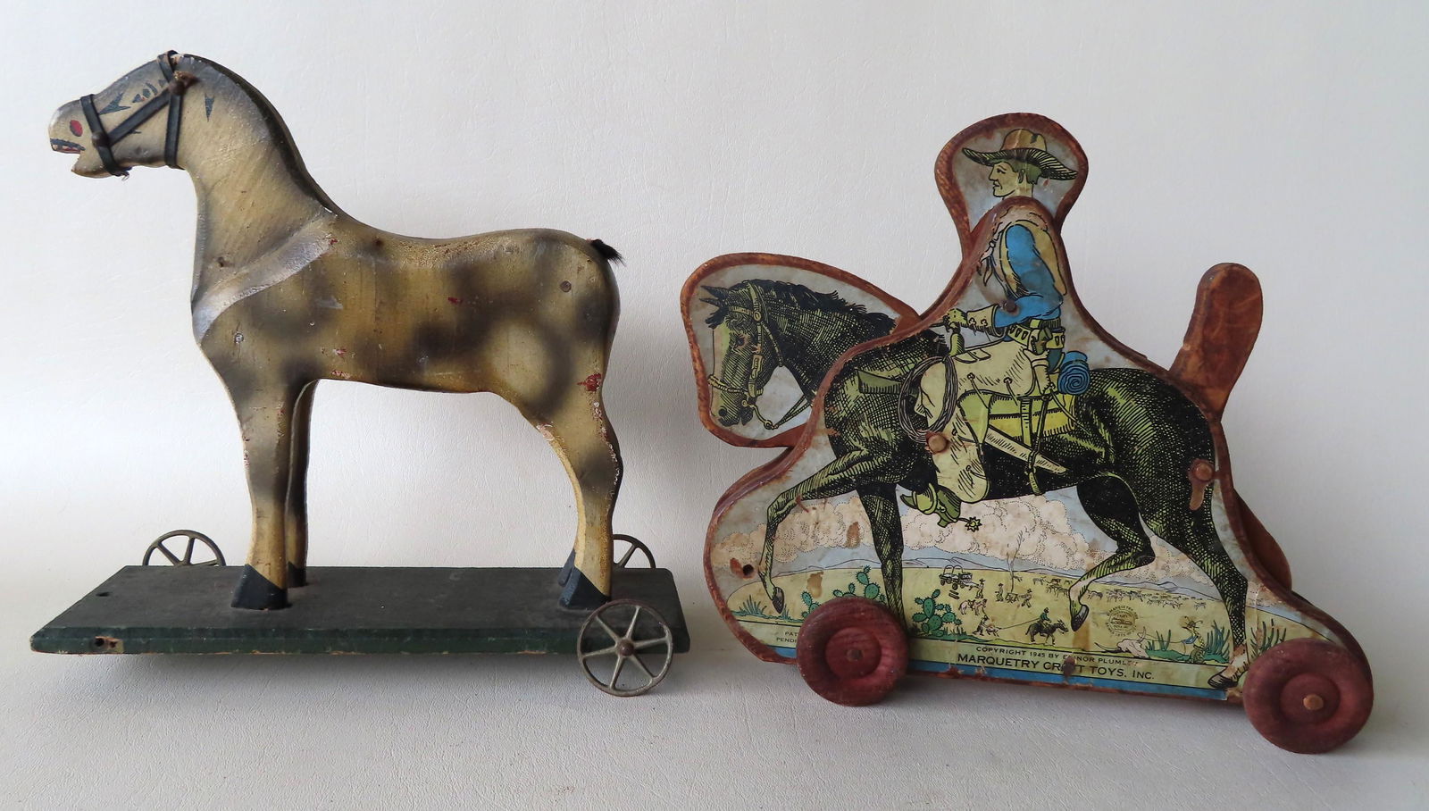 Two child's pull toys: The first, a wooden lithograph (1 of 5)