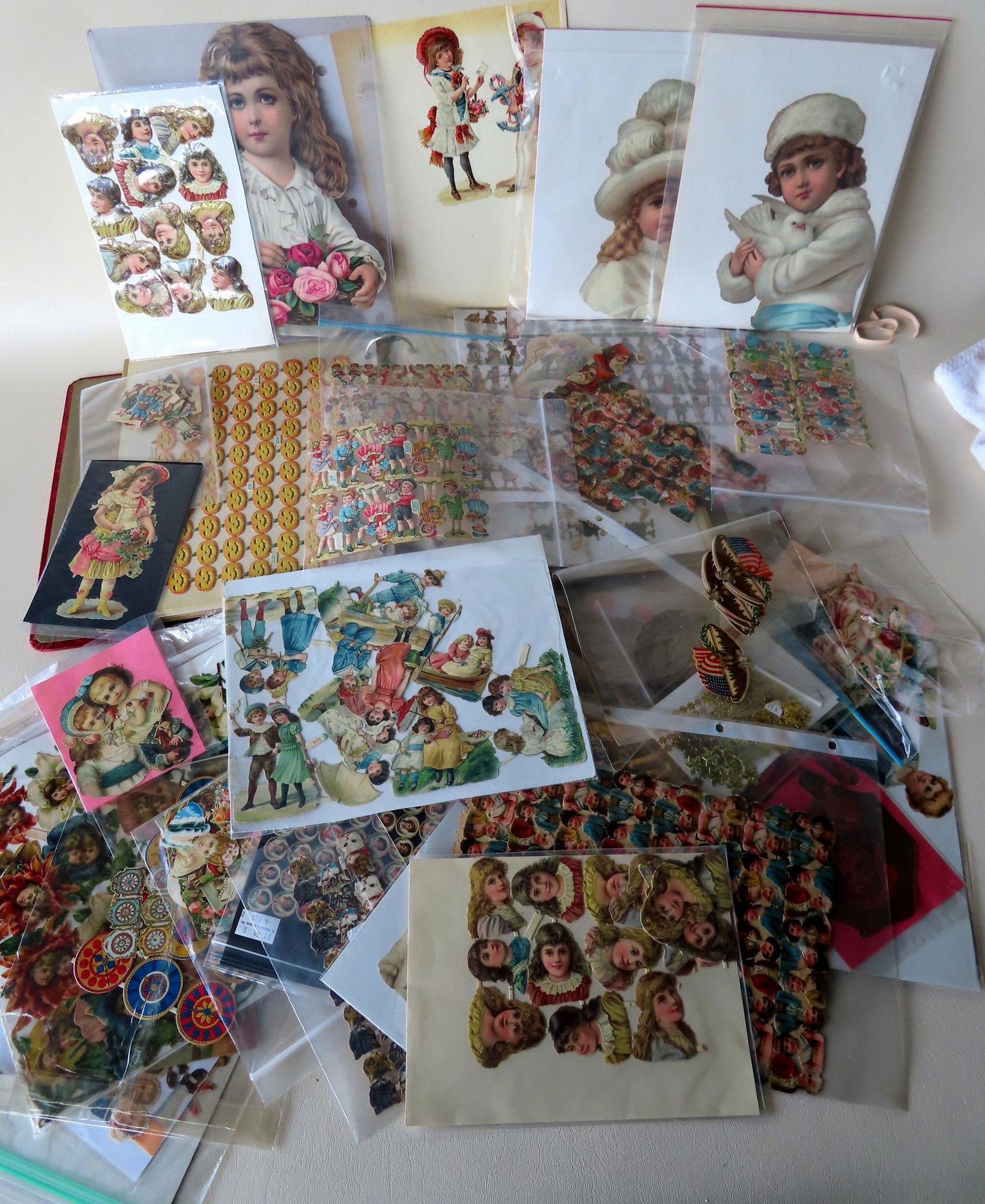 A large grouping of vintage German die-cuts including (1 of 15)