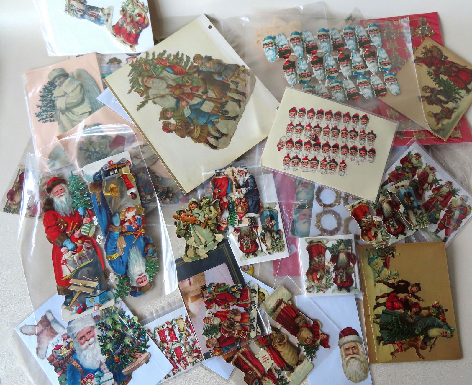 A large grouping of vintage German Christmas die-cuts, (1 of 19)
