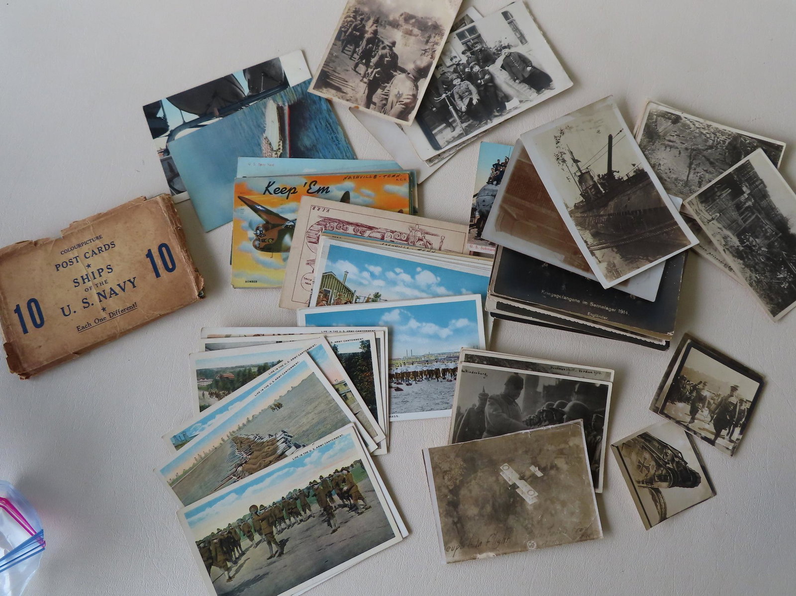 Grouping of approximately 61 military related postcards (1 of 11)