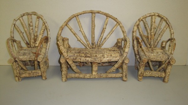Three piece doll size rustic porch set consisting o: Three piece doll size rustic porch set consisting of settee and 2 matching twig chairs.