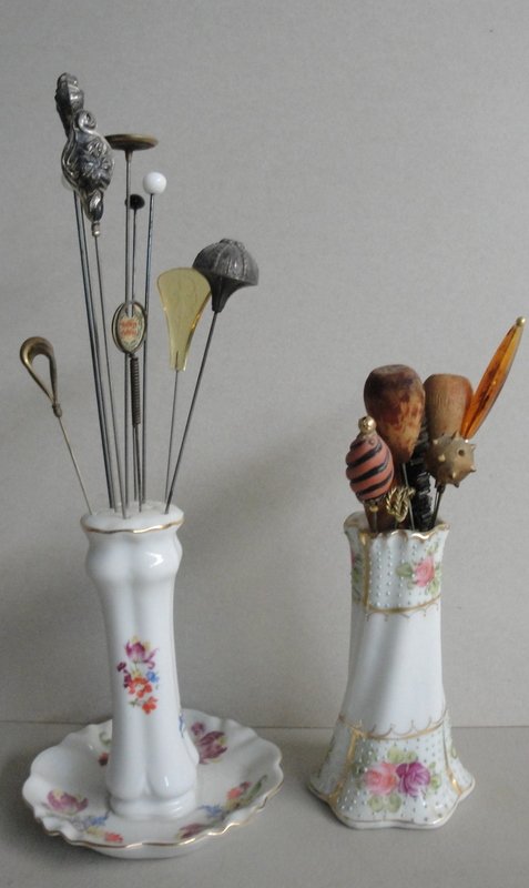 Grouping of ladies hat pins and 2 porcelain hat pi: Grouping of ladies hat pins and 2 porcelain hat pin holders, one signed Nippon.
