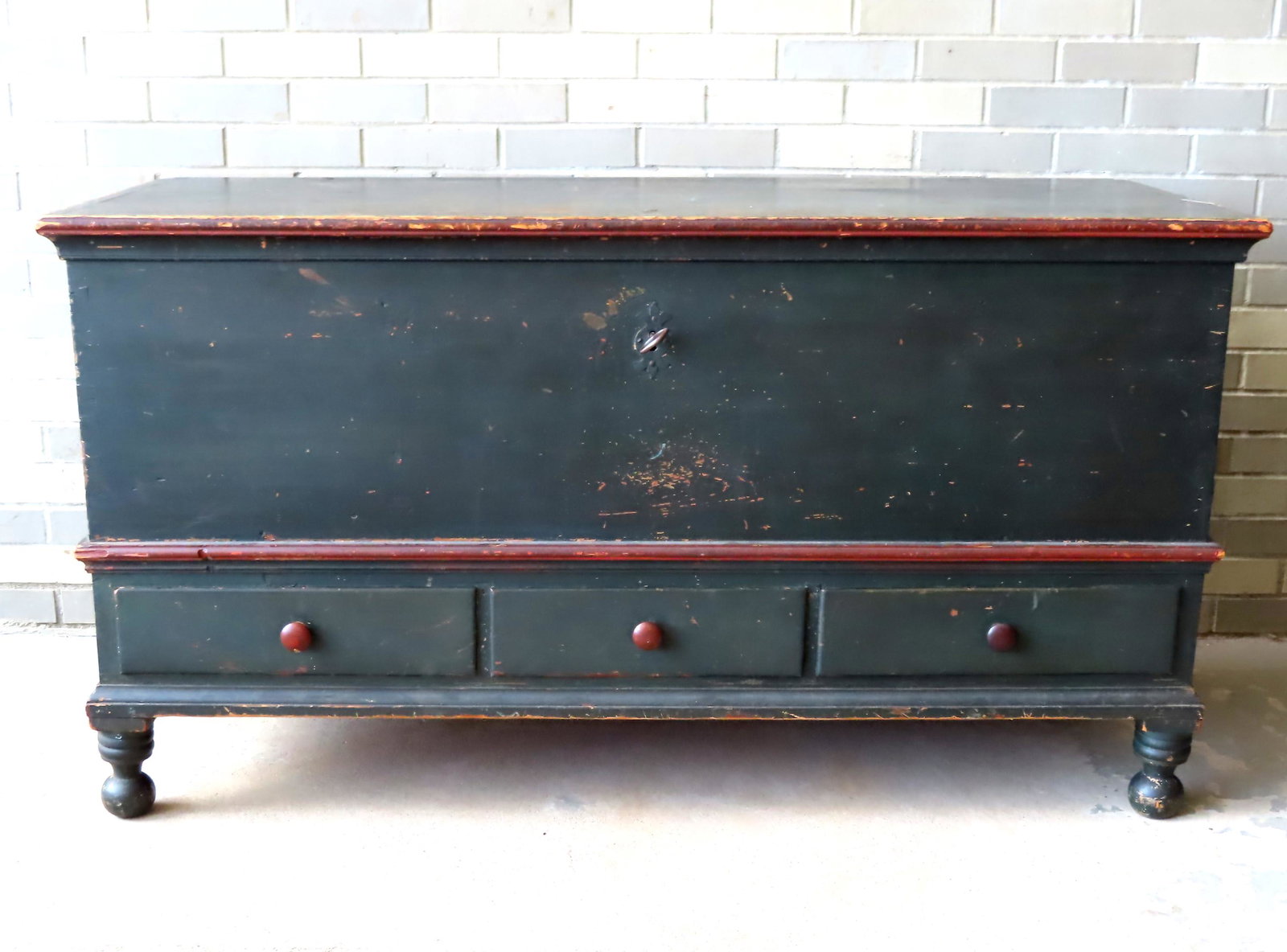 The best Hudson Valley dower blanket chest in original: The best Hudson Valley dower blanket chest in original blue-green paint with red horizontal moldings around case, having shaped rattail hinges, original hand forged lock and hasp (lock with key in goo
