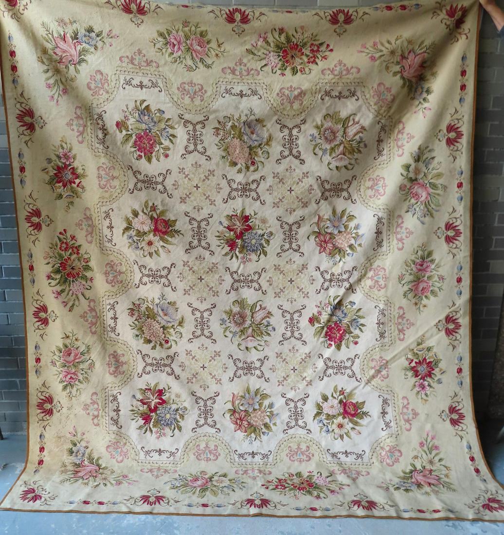 Aubusson style floral needlepoint room size rug, late: Aubusson style floral needlepoint room size rug, late 20th century, labeled â€œWoollen Needlepoint Rug / Made in China / Michaelian & Kohlberg Inc. New York NY”. Measures 9' 6 1/2" x 8'. Ver