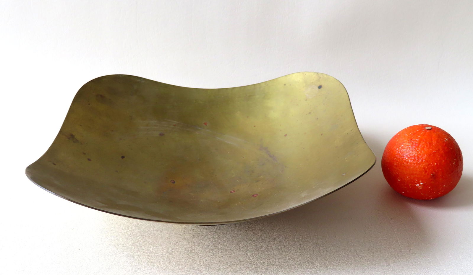 Dirk Van Erp hand hammered and polished brass center: Dirk Van Erp hand hammered and polished brass center bowl on circular footed base signed "Hand Wrought / (windmill image) / Dirkvanerp / SanFrancisco". Very good condition - 11 1/8" x 11 3/8" x 3 3/8"