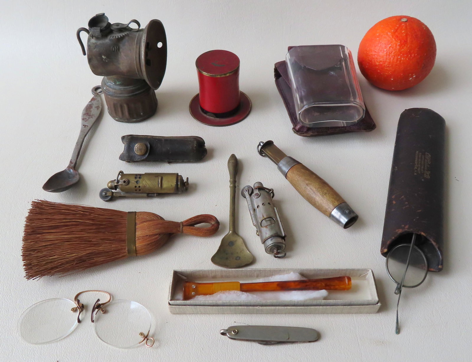 Grouping of 14 vintage collectibles including: A signed: Grouping of 14 vintage collectibles including: A signed Holmberg Eskilstuna Sweden barrel knife with burl handle - knife with open blade 6 1/4"L - very good condition; a chrome jigger set contained wi