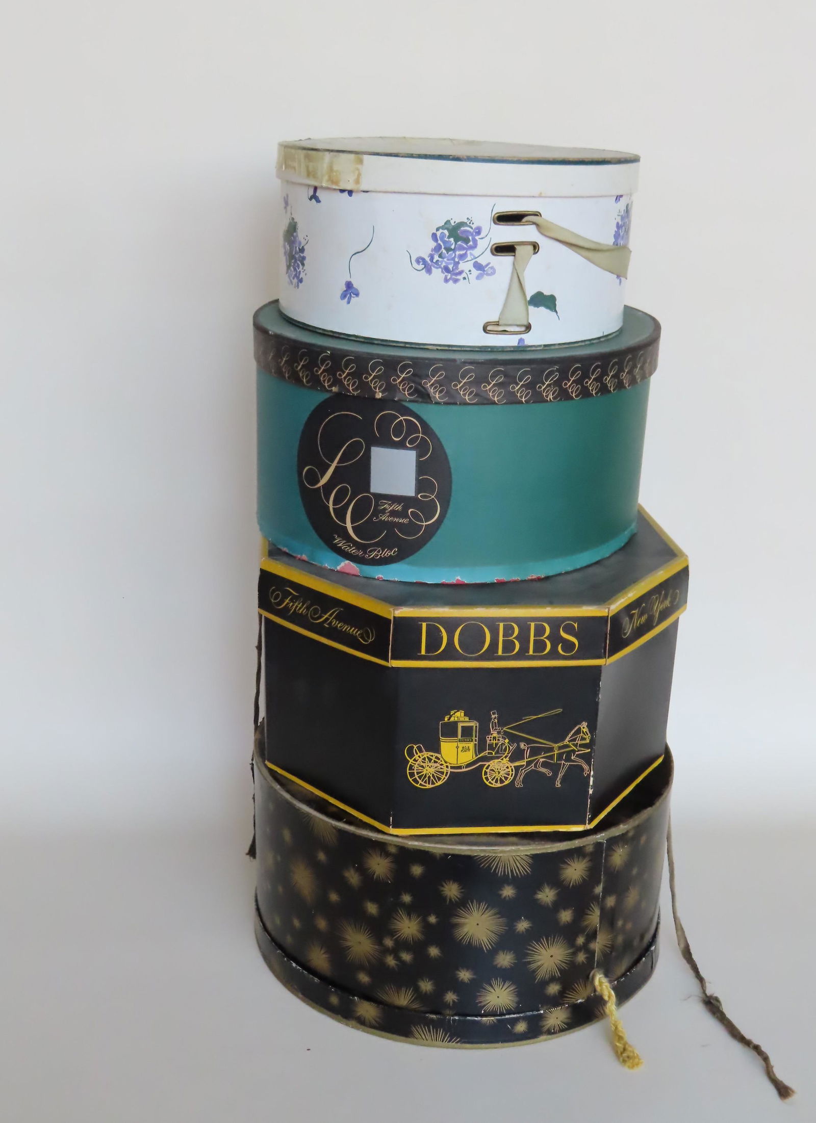 Grouping of ladies and gents vintage hats including:: Grouping of ladies and gents vintage hats including: Three lady's fabric bonnets and 3 straw bonnets - one straw hat marked "MGM Elizabeth Taylor Original"; 2 boy scout hats, one with label that reads