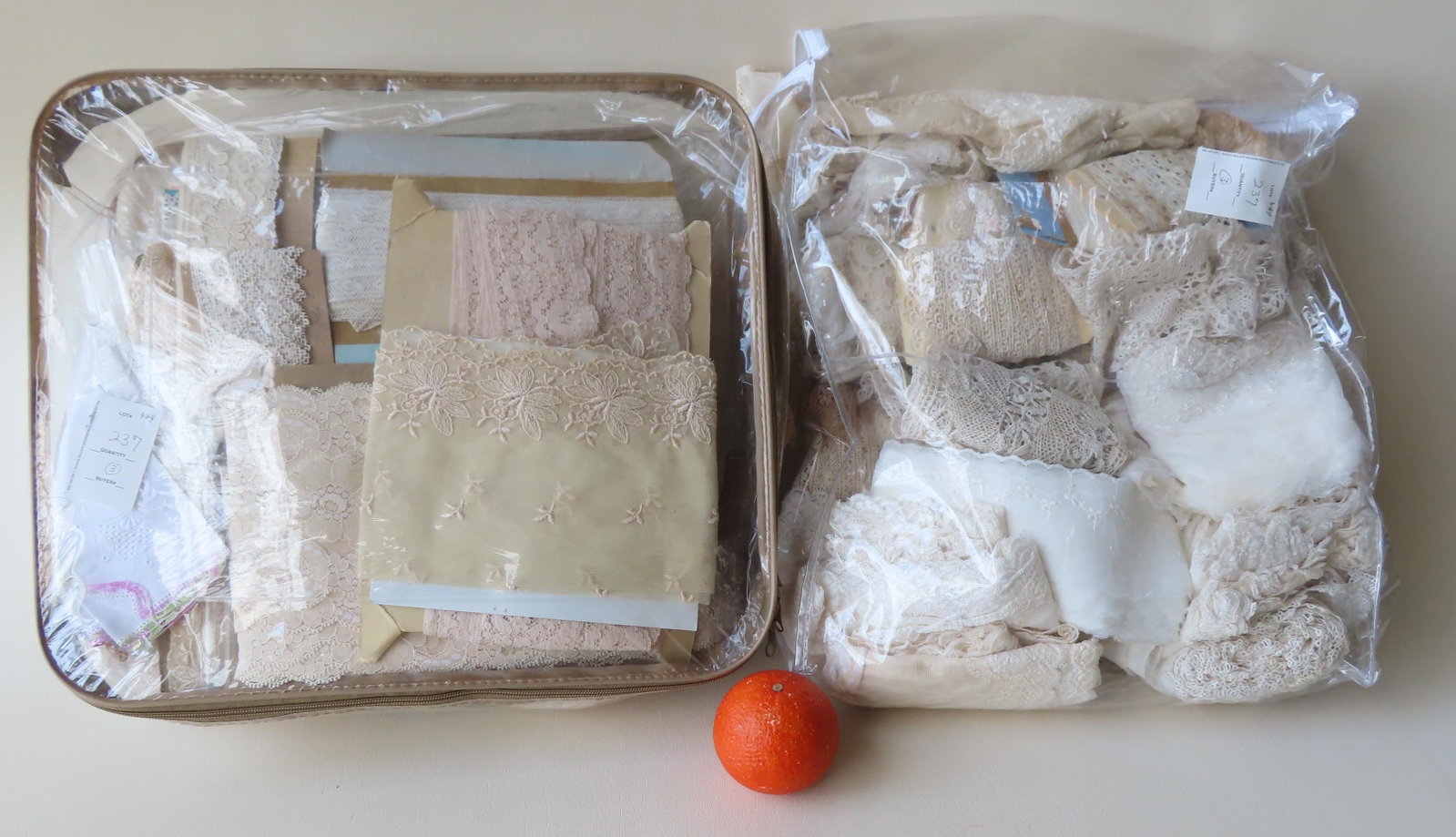 Large lot of linens and lace fabrics: Large lot of linens and lace fabrics, some in original bolts, most early 20th century. One bolt of lace marked "Whelan Lace / New York / Paris" - 16 yards. See photos for more information.