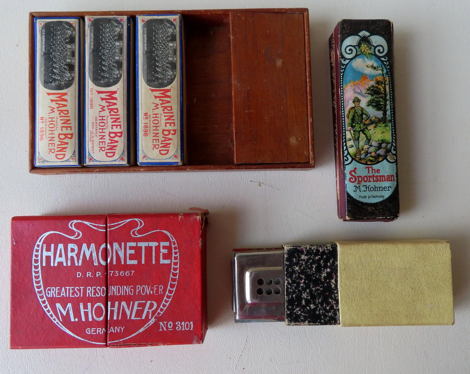 Grouping of 7 harmonicas including 3 M. Hohner's: Grouping of 7 harmonicas including 3 M. Hohner's "Marine Band" in original boxes - all in very good condition, Harmonette by M. Hohner in original box - good condition, "The Sportsman" by M. Hohner in