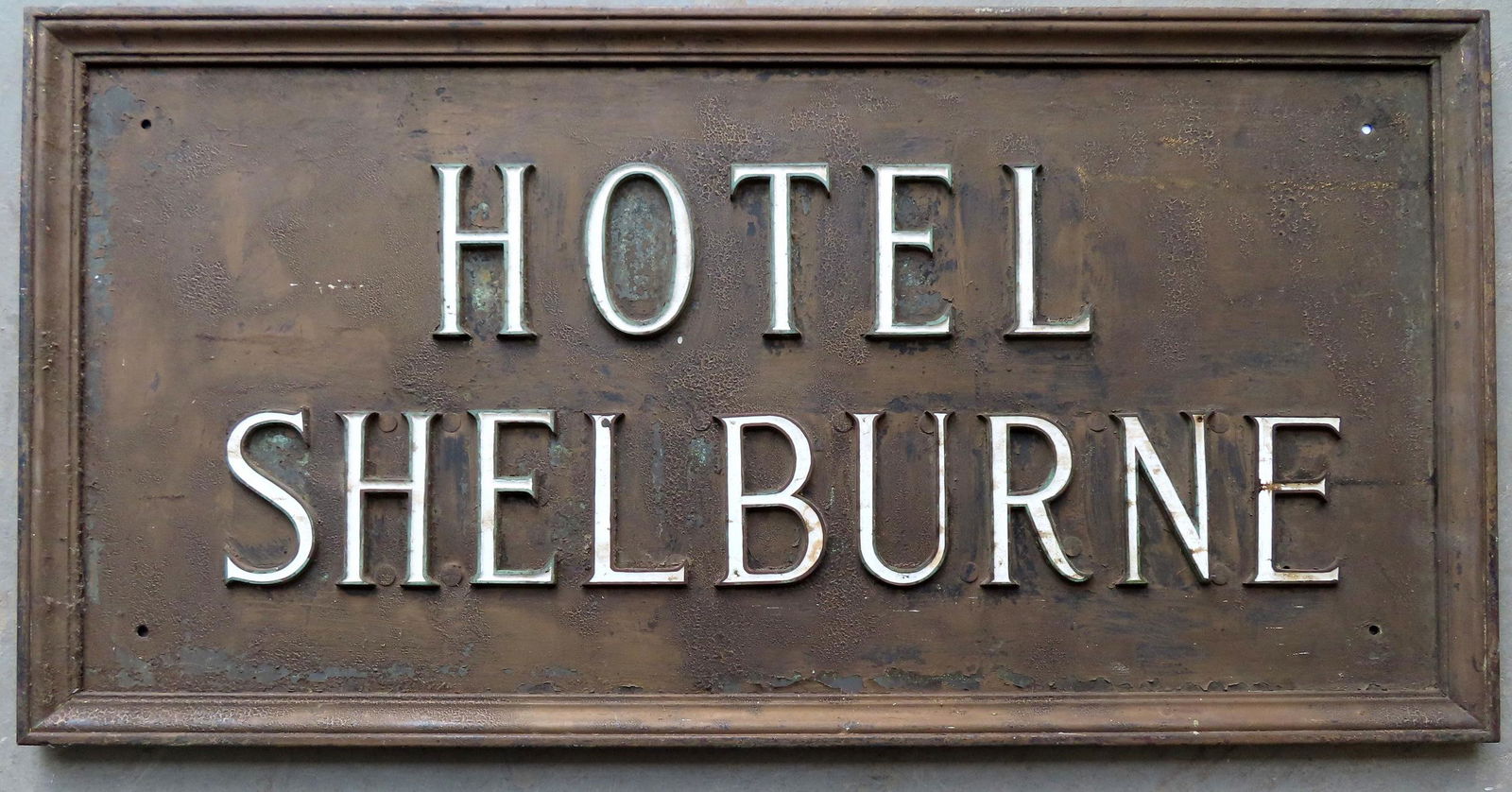 Tin sign with cast iron picture frame molding marked (1 of 3)