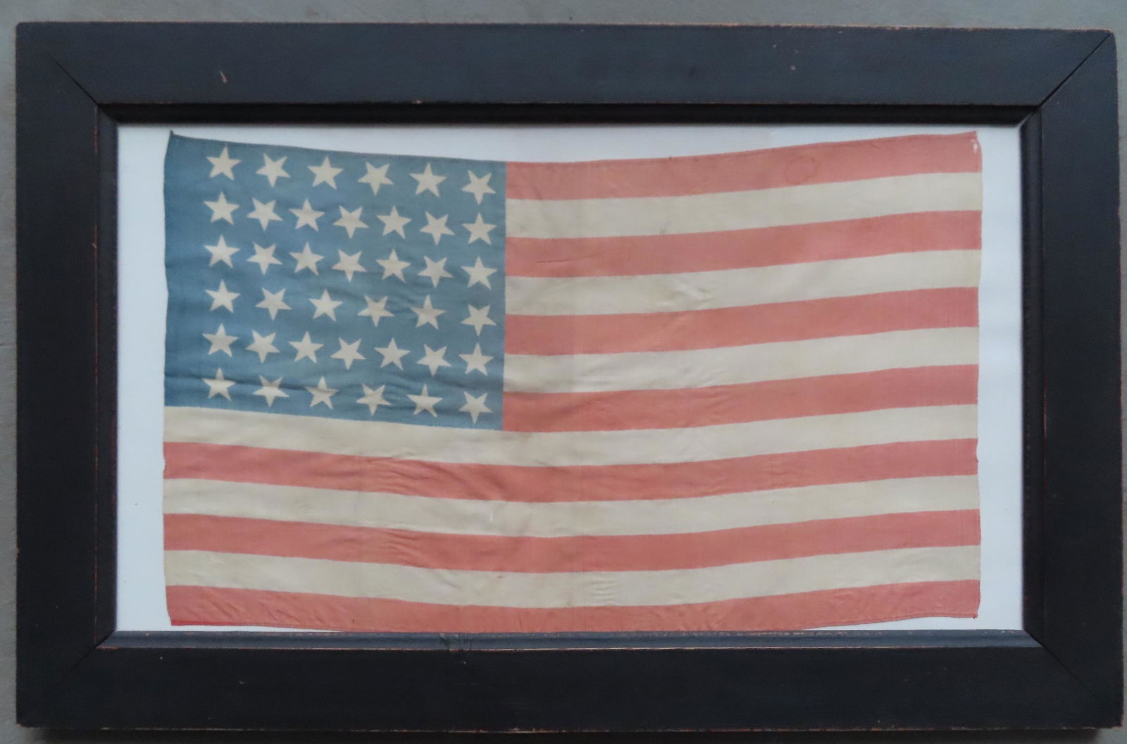 A framed 39 star parade flag printed on silk, circa (1 of 3)