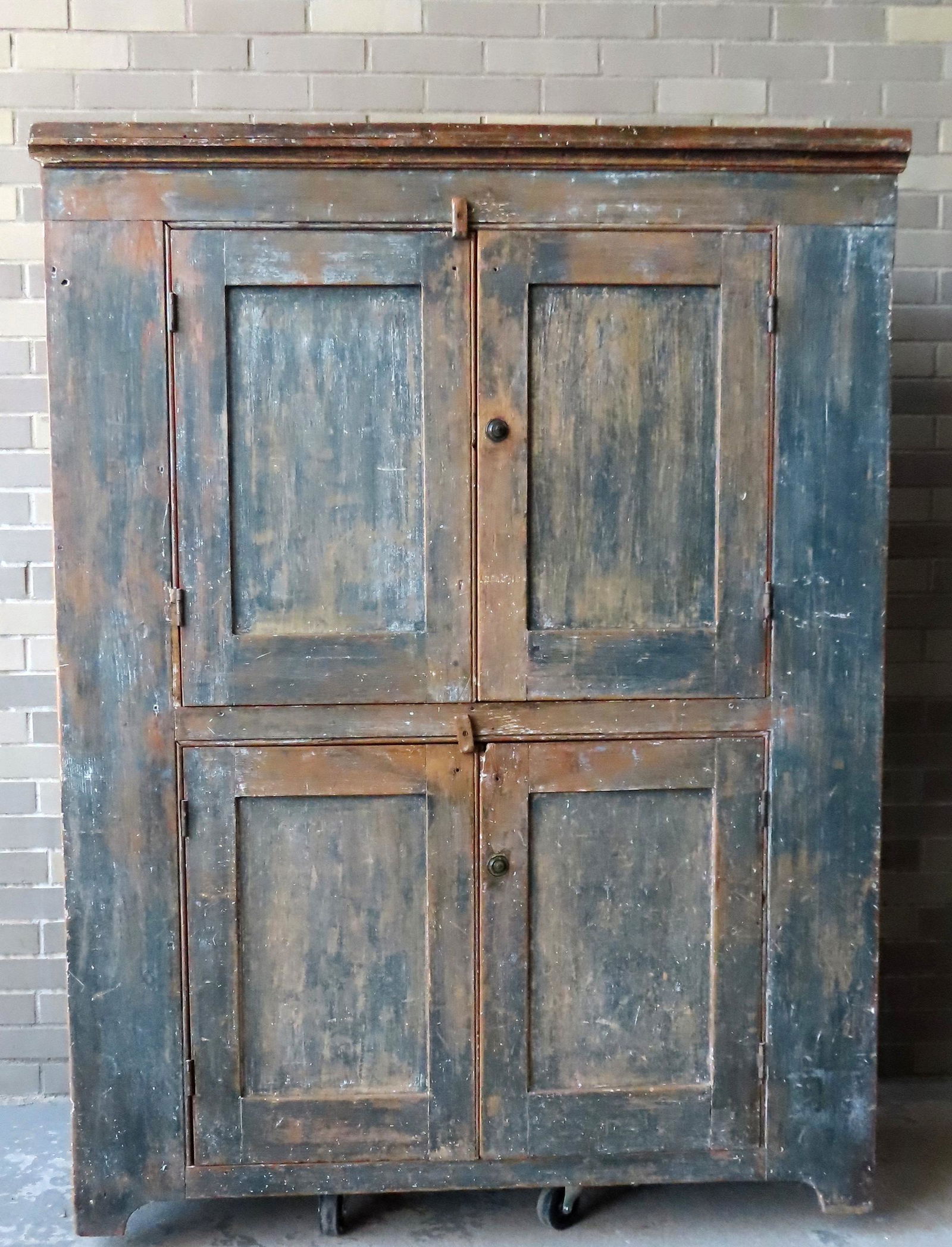 A primitive cupboard, the front scraped down to (1 of 10)