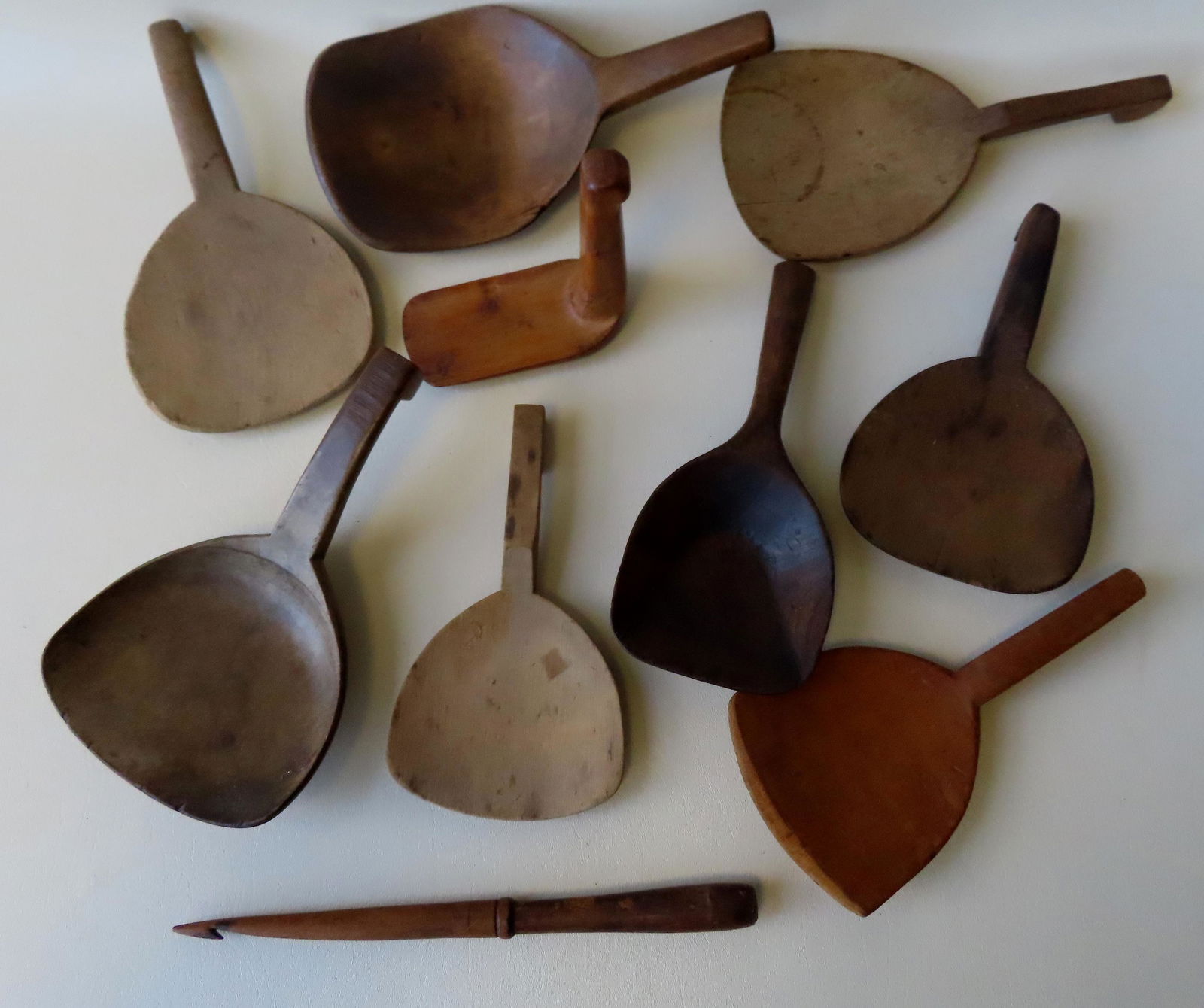 A grouping of treenware including  7 butter paddles, 1 (1 of 4)