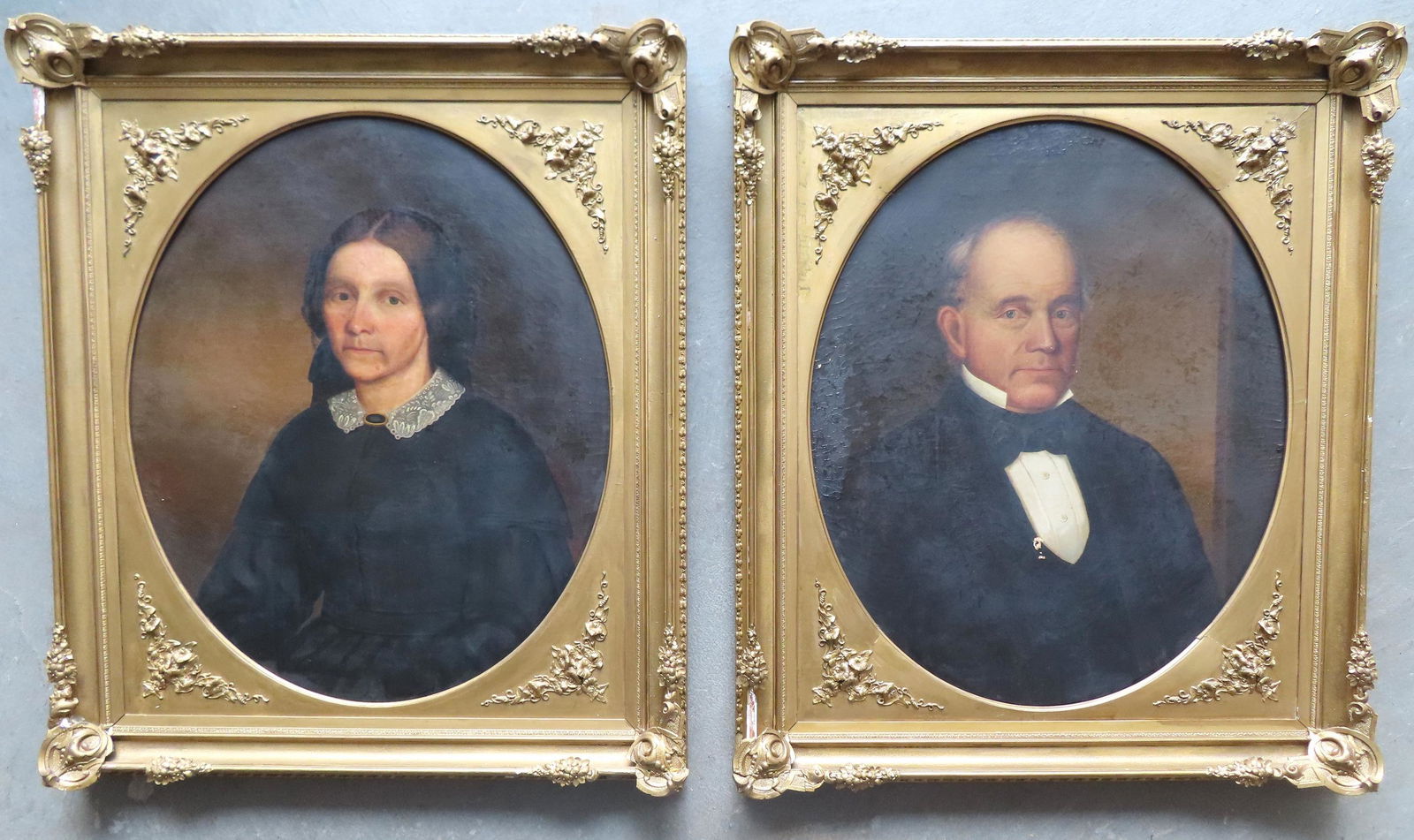 A large pair of O/C Portraits of husband and wife, in (1 of 20)