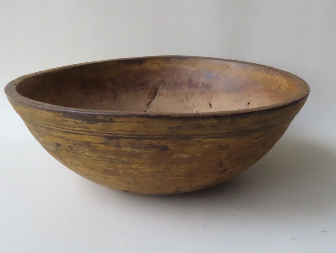 A treenware bowl with an unusual stepped molded rim, (1 of 4)