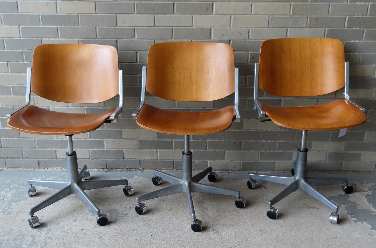 Three matching mid-century modern office chairs having (1 of 9)