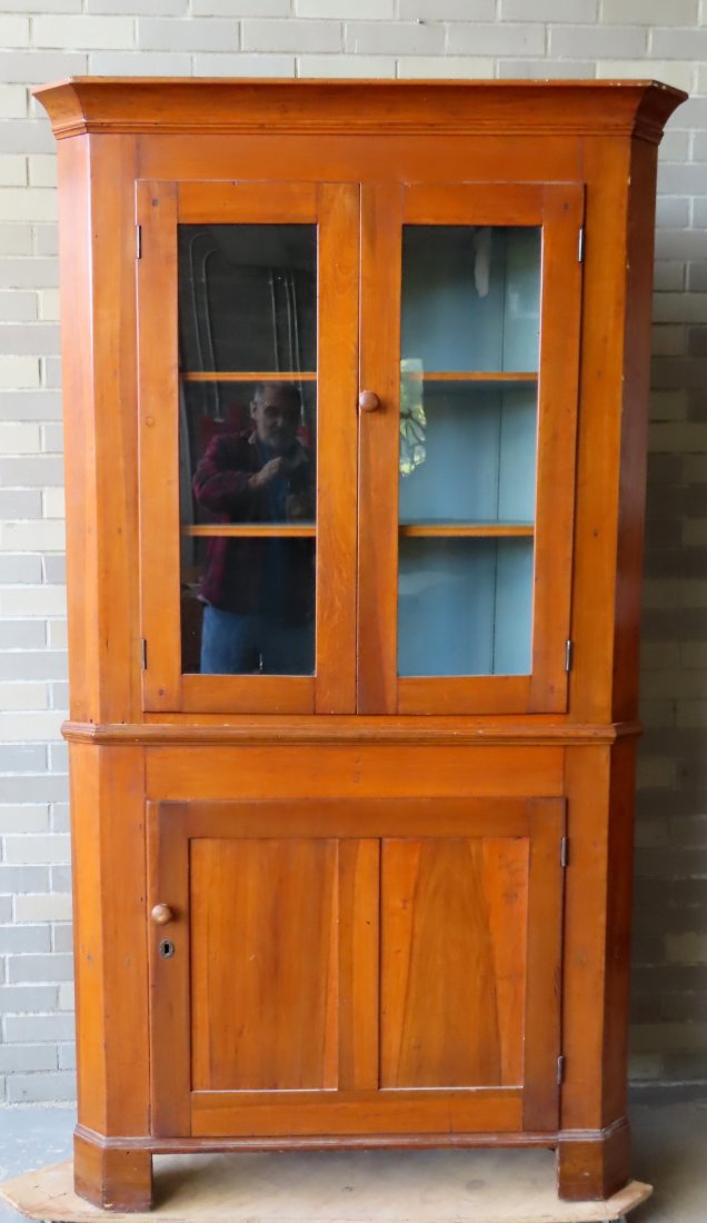 An early poplar wood 2 part corner cupboard having 2 (1 of 8)