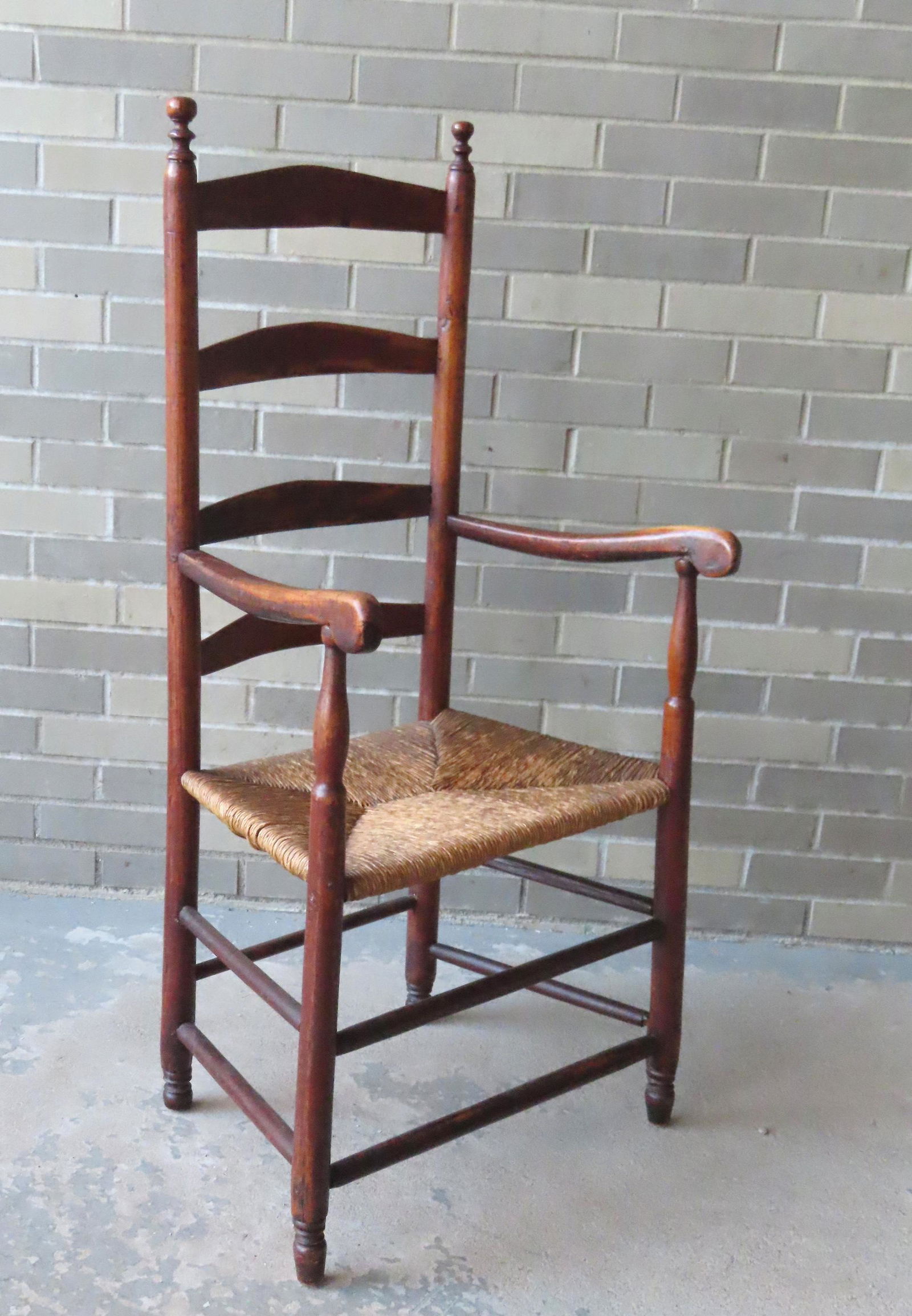 An early ladder back arm chair of small size with (1 of 11)