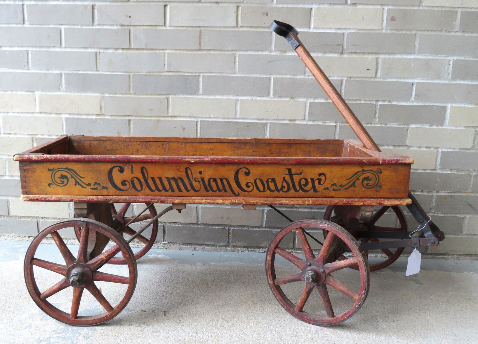 An original stenciled child's wagon marked "COLUMBIAN (1 of 9)