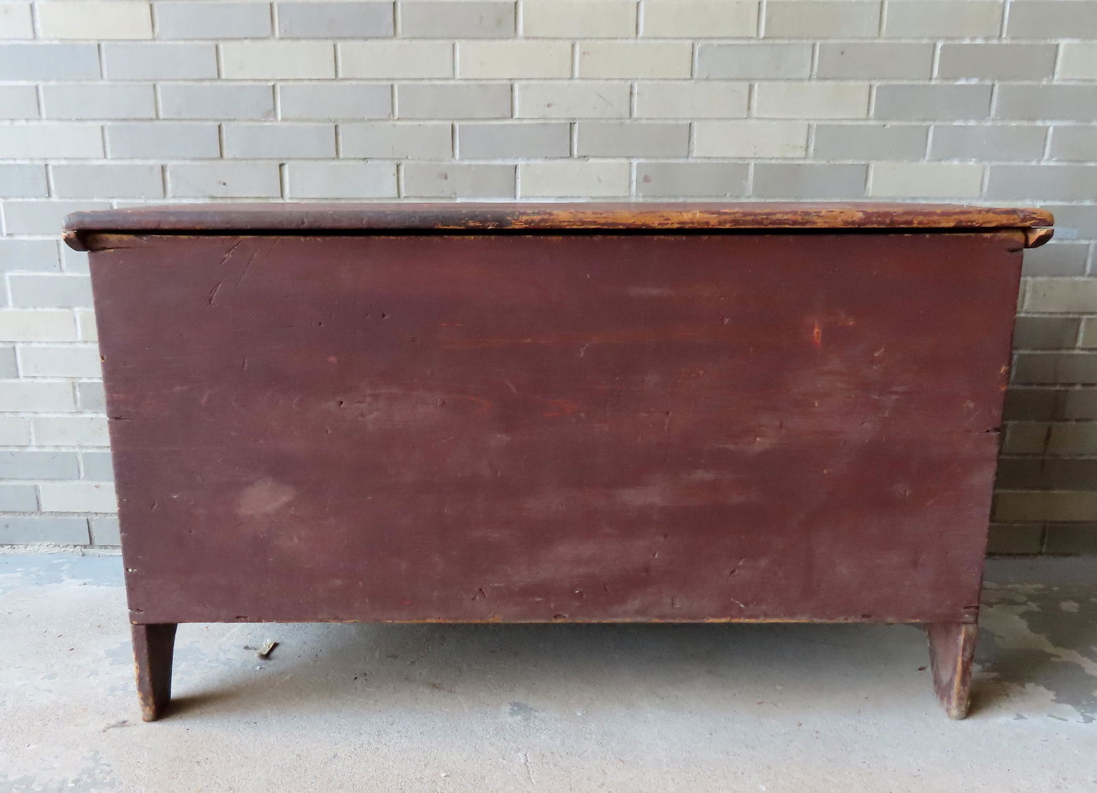 A primitive blanket box in original red paint, having (1 of 7)