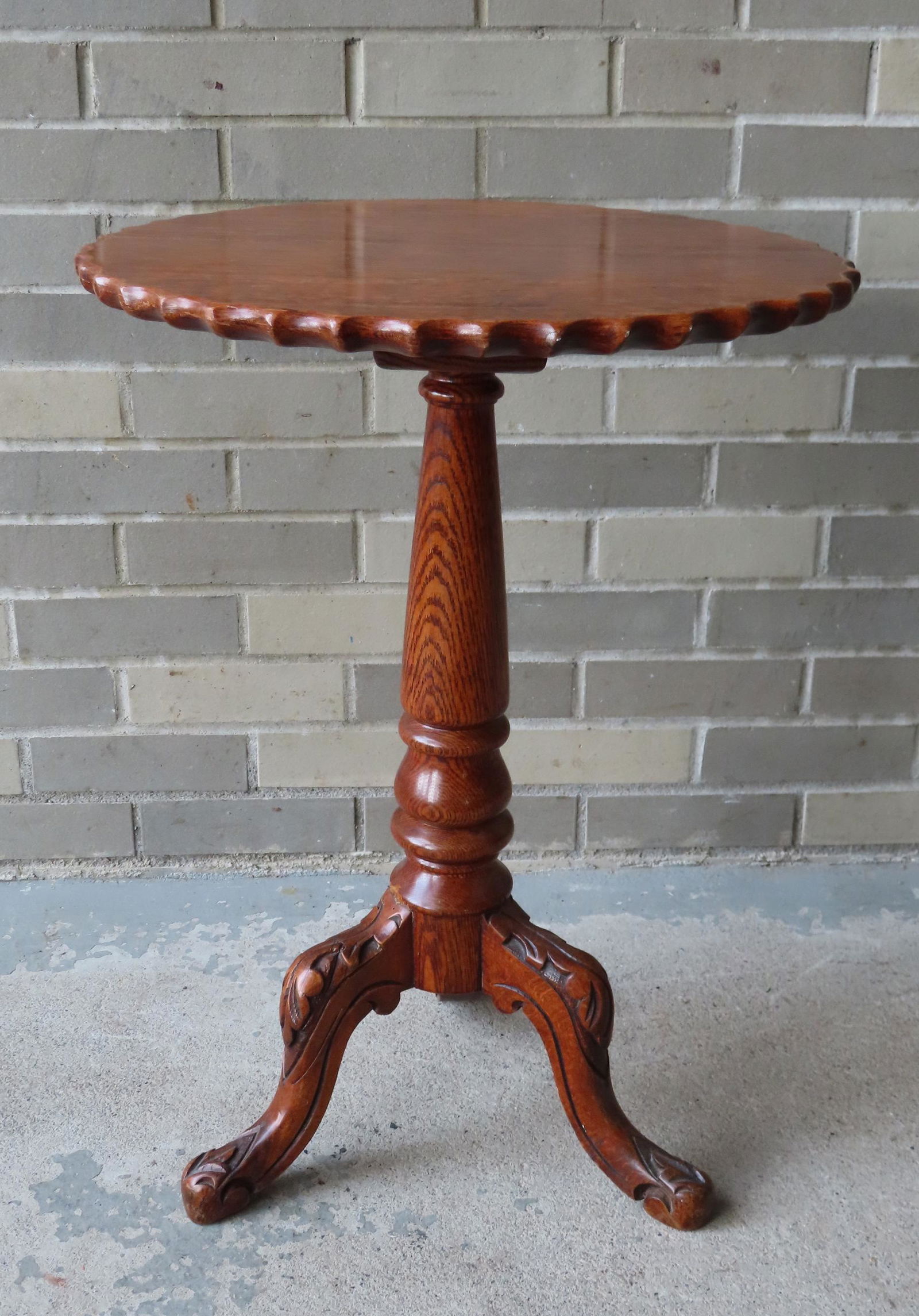 A fancy oak candlestand with coggled edge over turned (1 of 4)