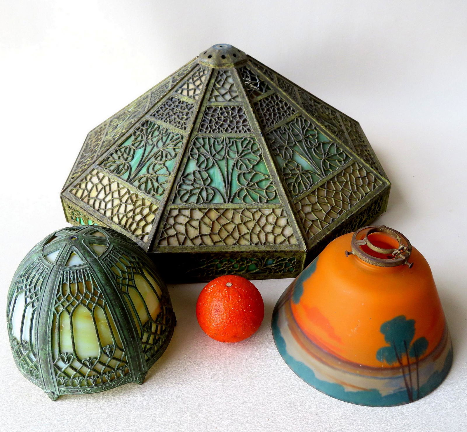 Three Arts & Crafts style lamp shades. The first with (1 of 14)