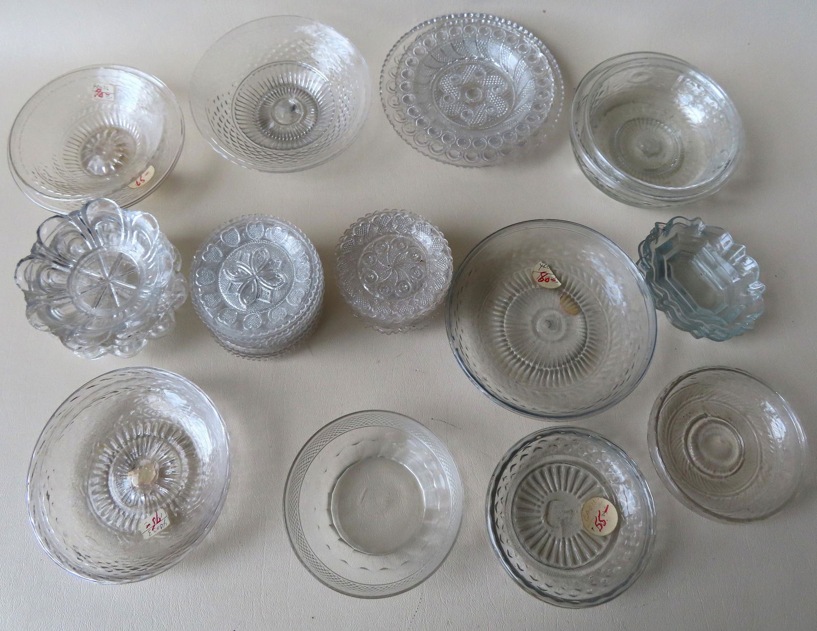 A large grouping of early colorless glass including: 11 (1 of 12)