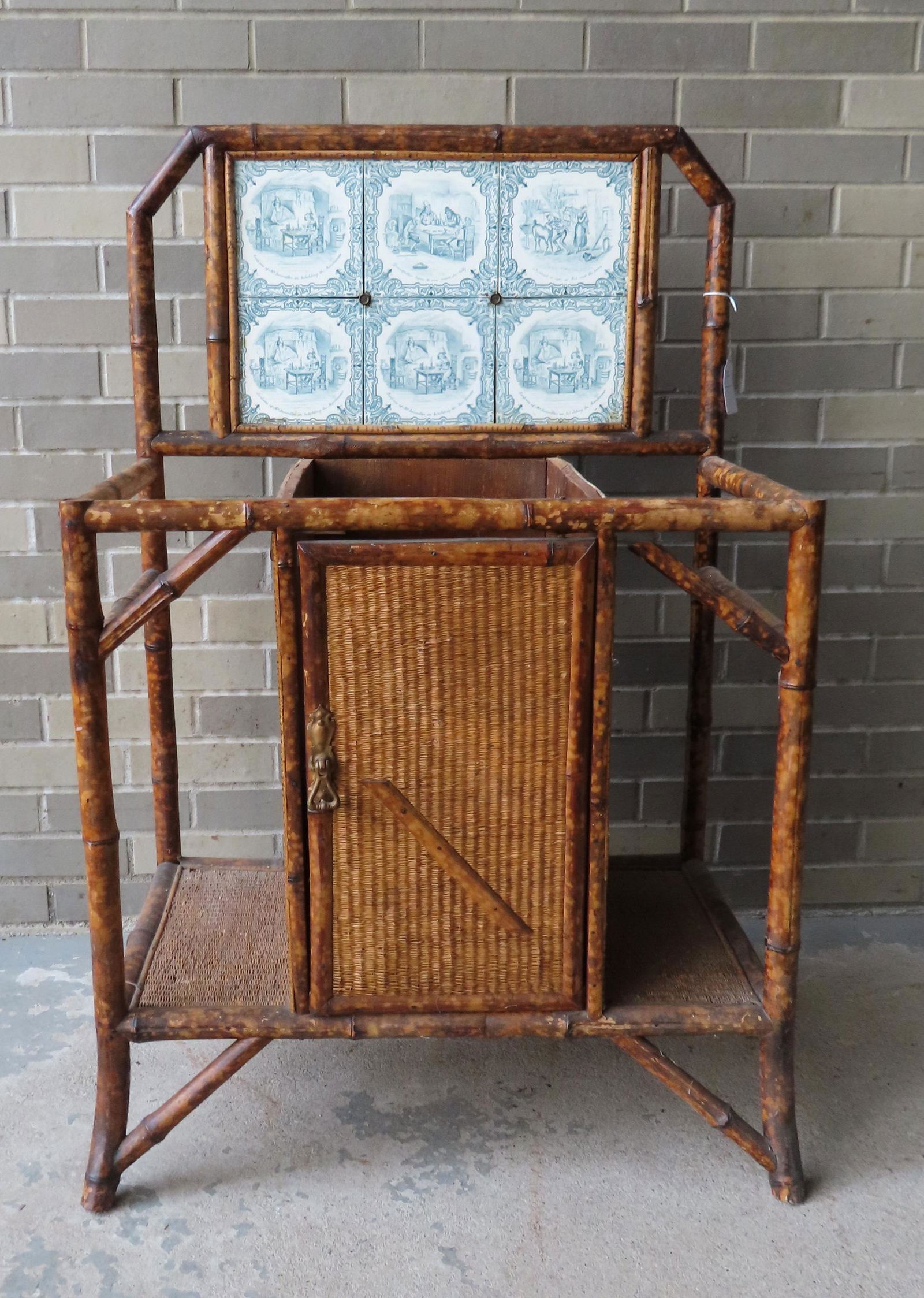 A bamboo hall stand with tiled back. It held a marble (1 of 5)