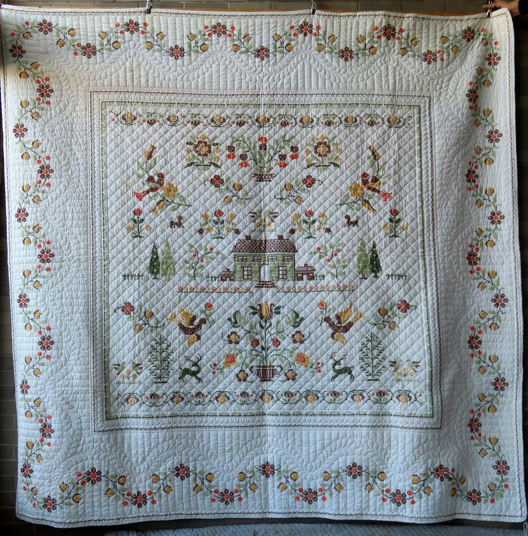 A beautiful cross-stitched pictorial quilt having a (1 of 10)