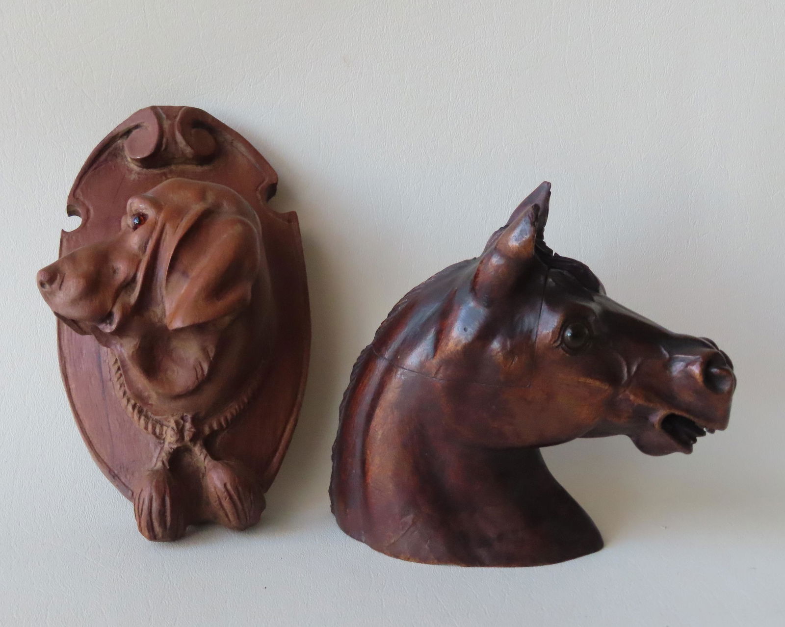Two carved wooden animal figures including a horse head (1 of 9)