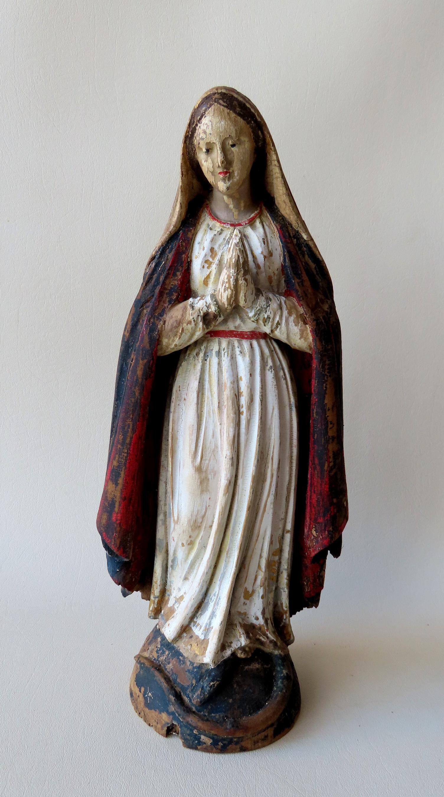 A beautiful wooden sculpture of the Blessed Virgin Mary: A beautiful wooden sculpture of the Blessed Virgin Mary with serpent below feet, in original paint. Some wood chips/losses near bottom of cape, some paint wear, but overall good condition. Probably mi
