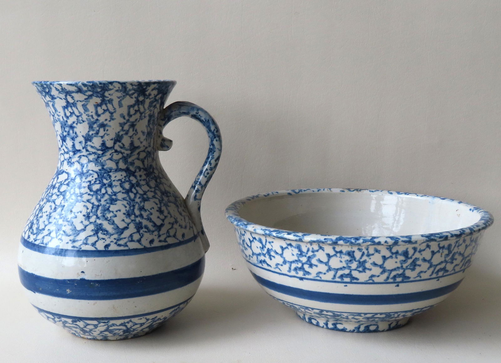 Two blue and white spongeware collectibles including a (1 of 9)
