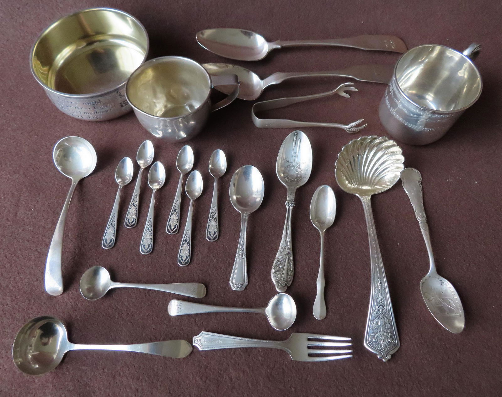 A grouping of sterling silver and 2 coin silver spoons. (1 of 11)