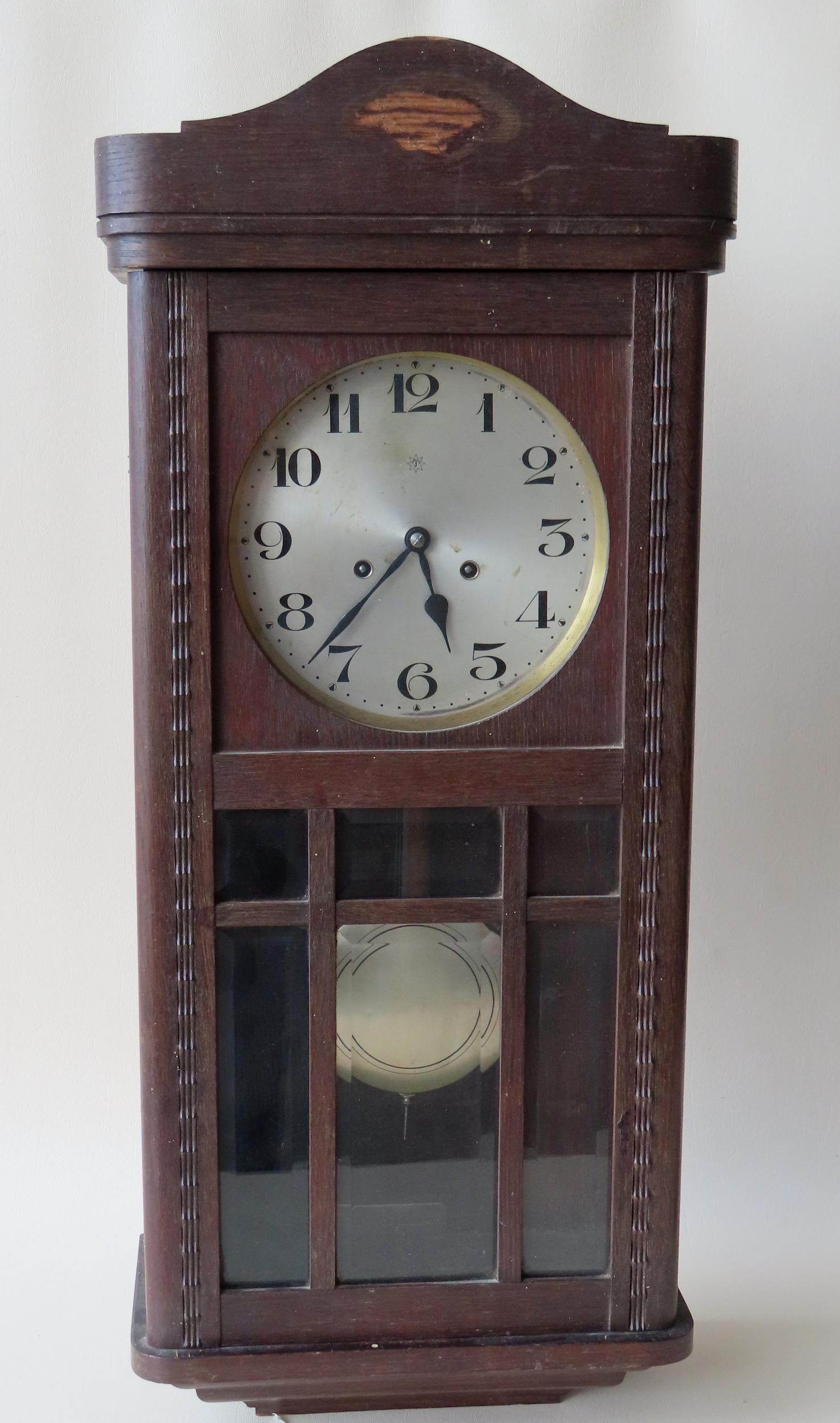 Jughans German oak wall clock with pendulum and key. (1 of 4)