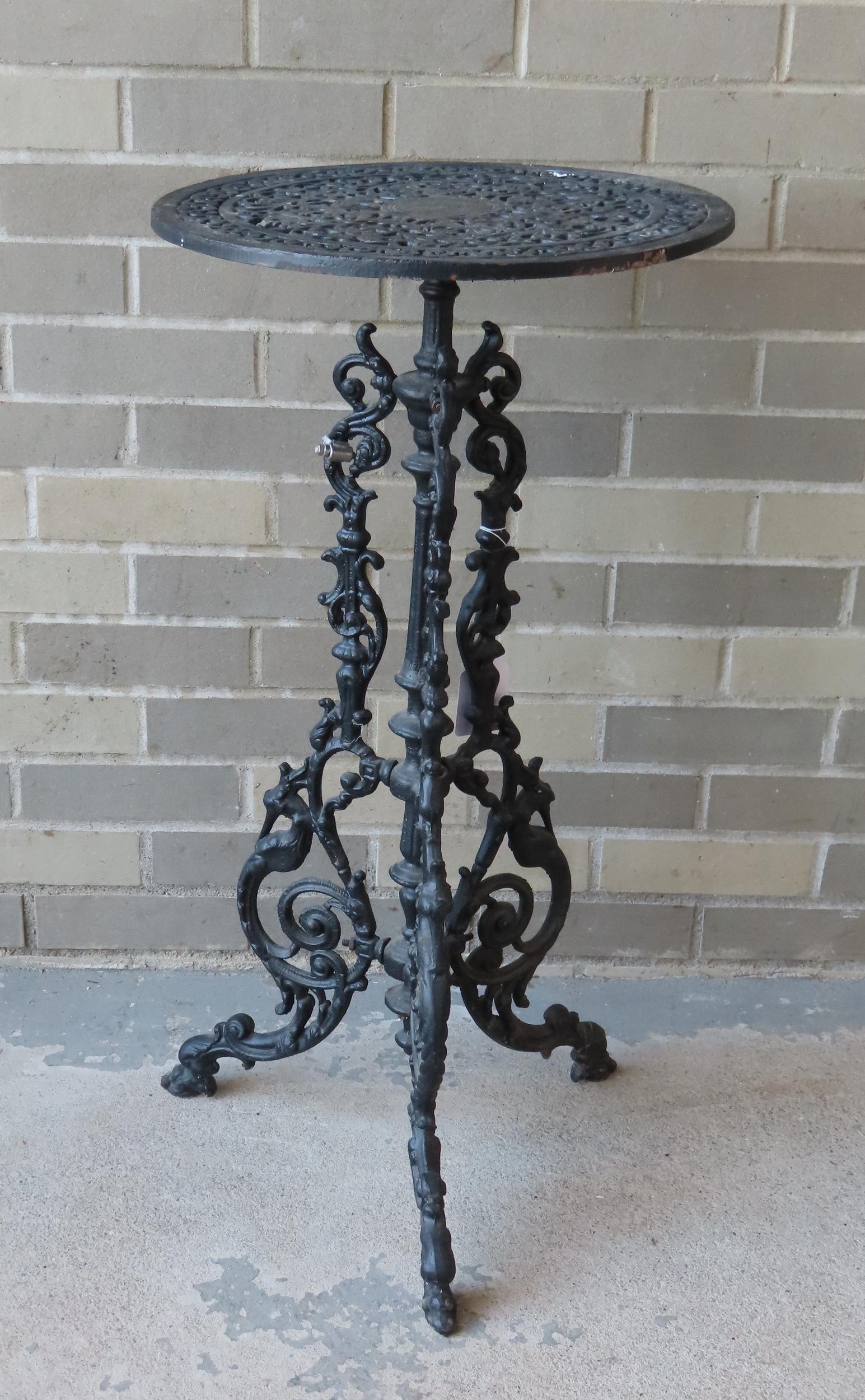 A cast iron pedestal base plant stand with open work (1 of 4)