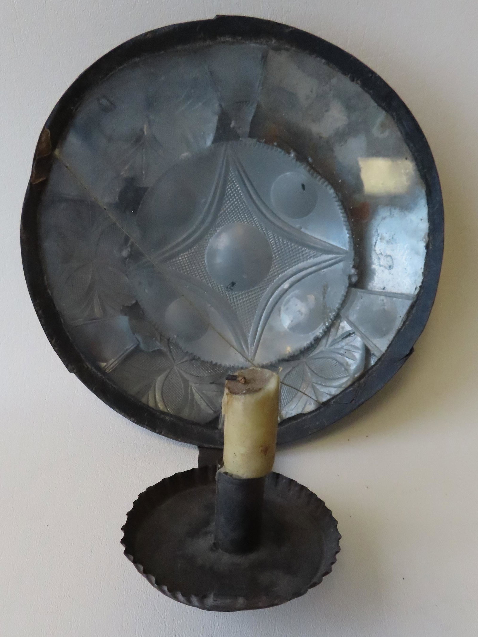 A rare early tin wall sconce with decorated metal (1 of 6)