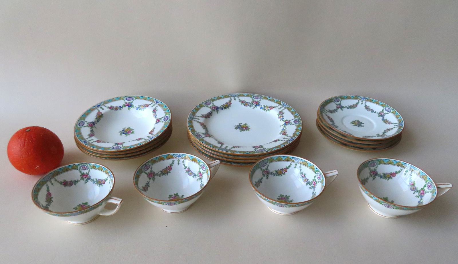 A Tiffany & Co. porcelain desert set signed "MINTONS / (1 of 12)