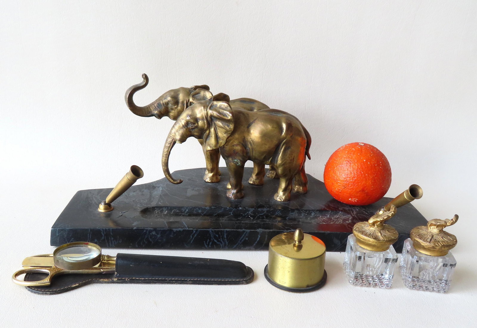 Grouping of desk related decorative objects including: (1 of 4)