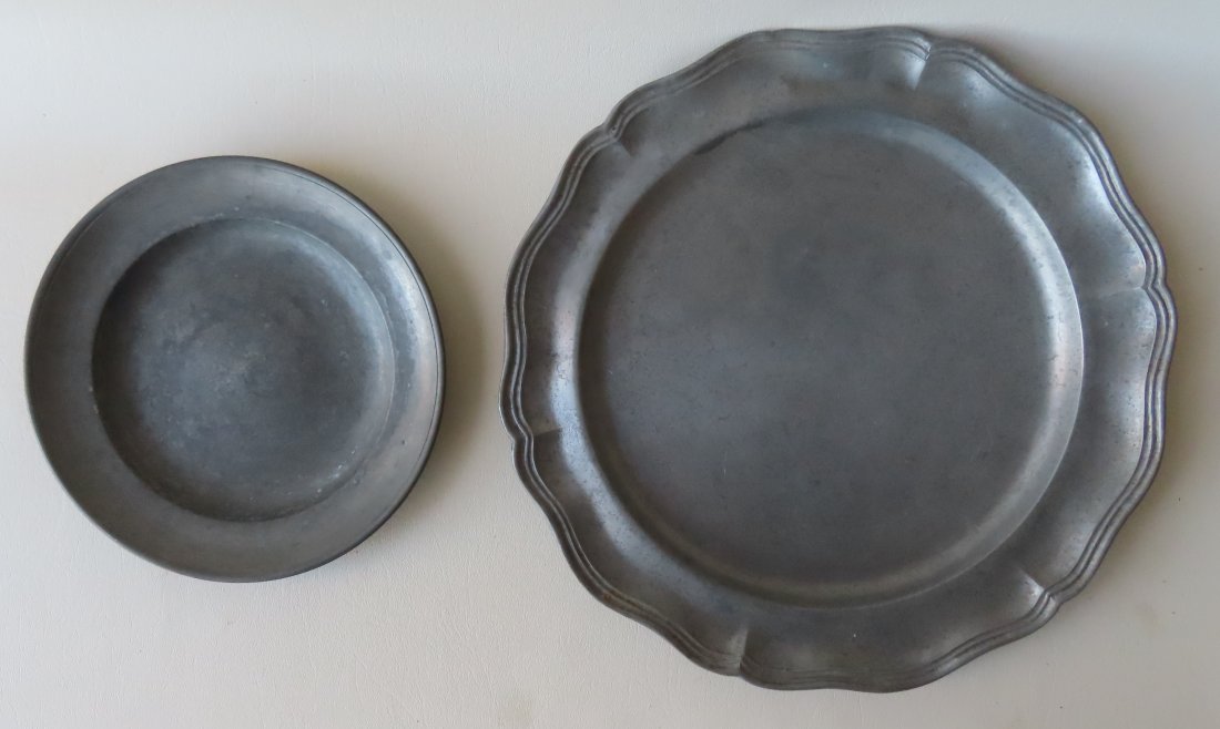 Two pieces of early pewter - charger and plate. (1 of 6)