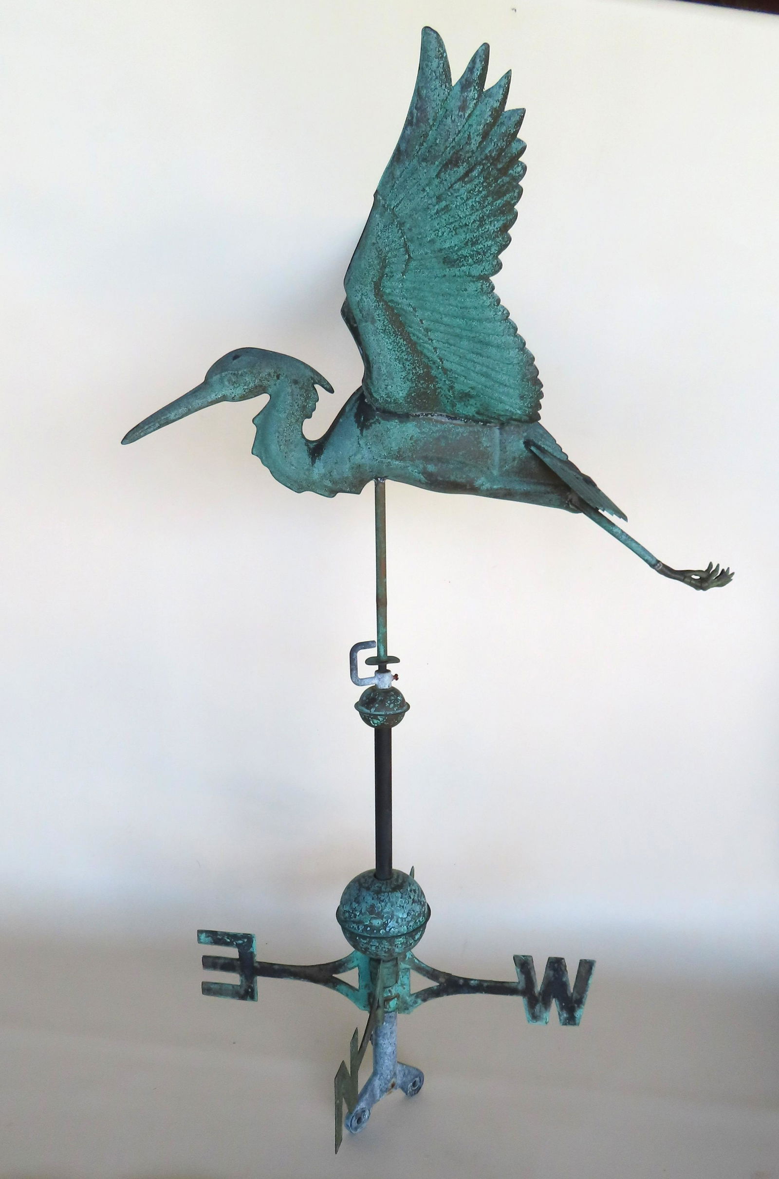 A full body copper Blue Heron weathervane with directionals and roof mounting bar, circa 1950-70. (1 of 17)