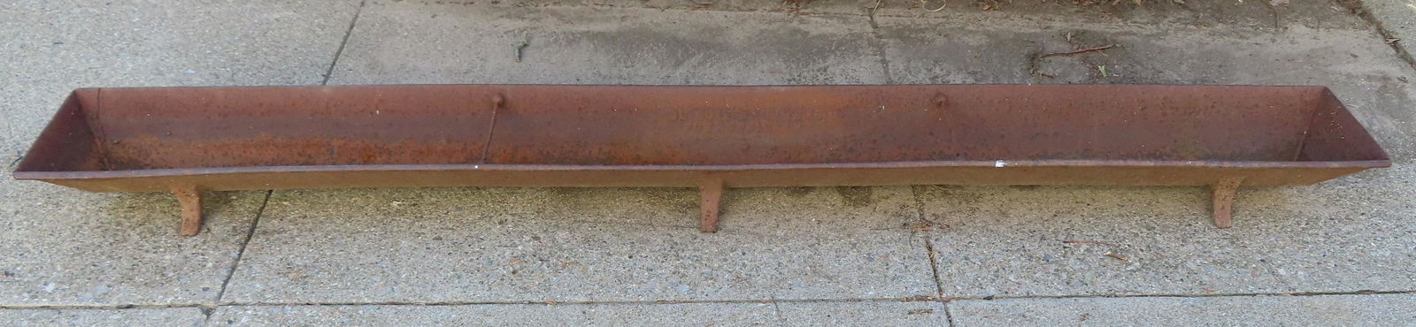 A long cast iron hog's feeding trough on footed base, signed "DuBois Brothers / Poughkeepsie N.Y."- (1 of 8)