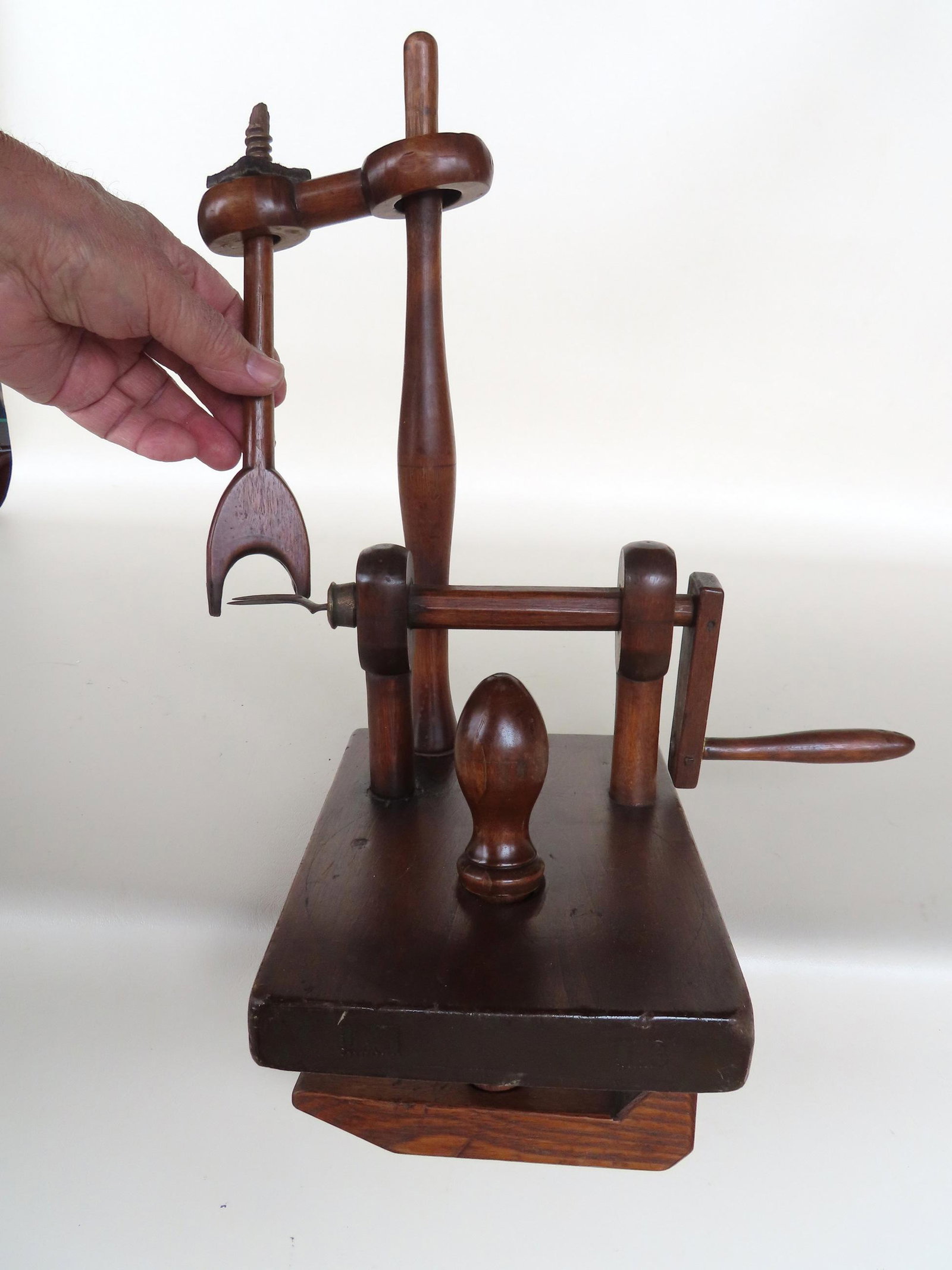 A Shaker wooden hand crank apple peeler with table mounting clamp, 19th century. Missing carved nut (1 of 9)