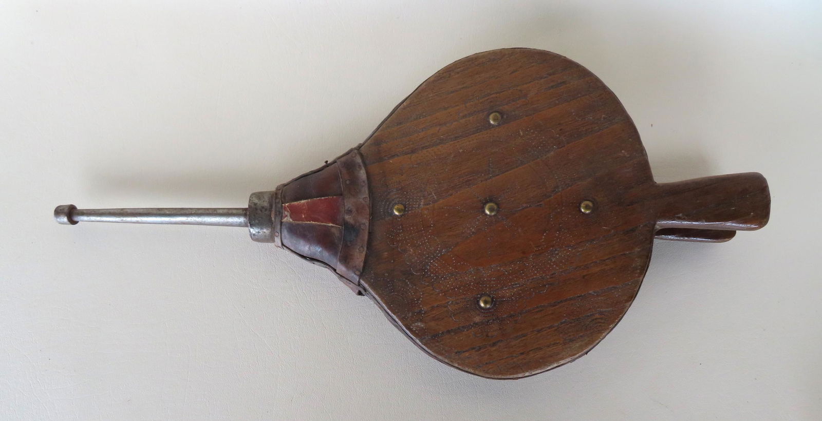 A carved wooden bellows with incised floral decorations forged iron hardware - the leather accordion (1 of 7)