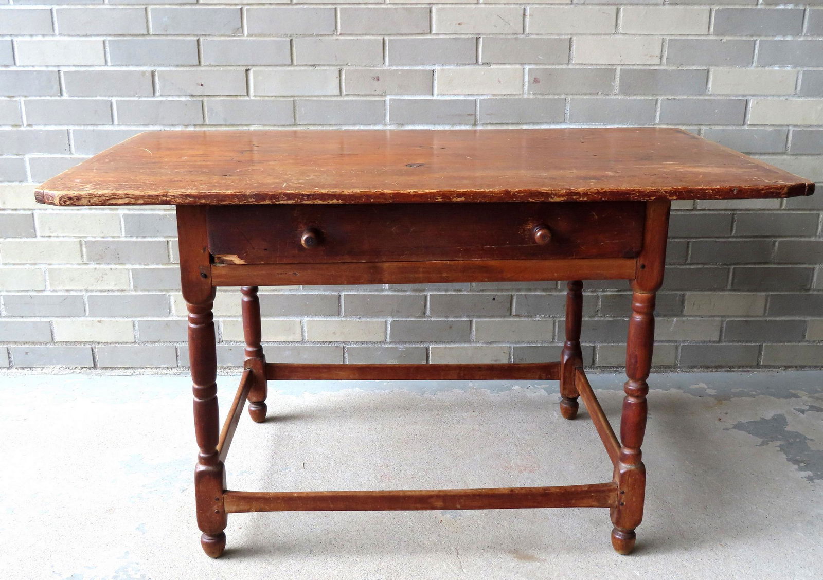 An early cherry tavern table with center drawer with carved wooden pulls, the single board pine top (1 of 11)