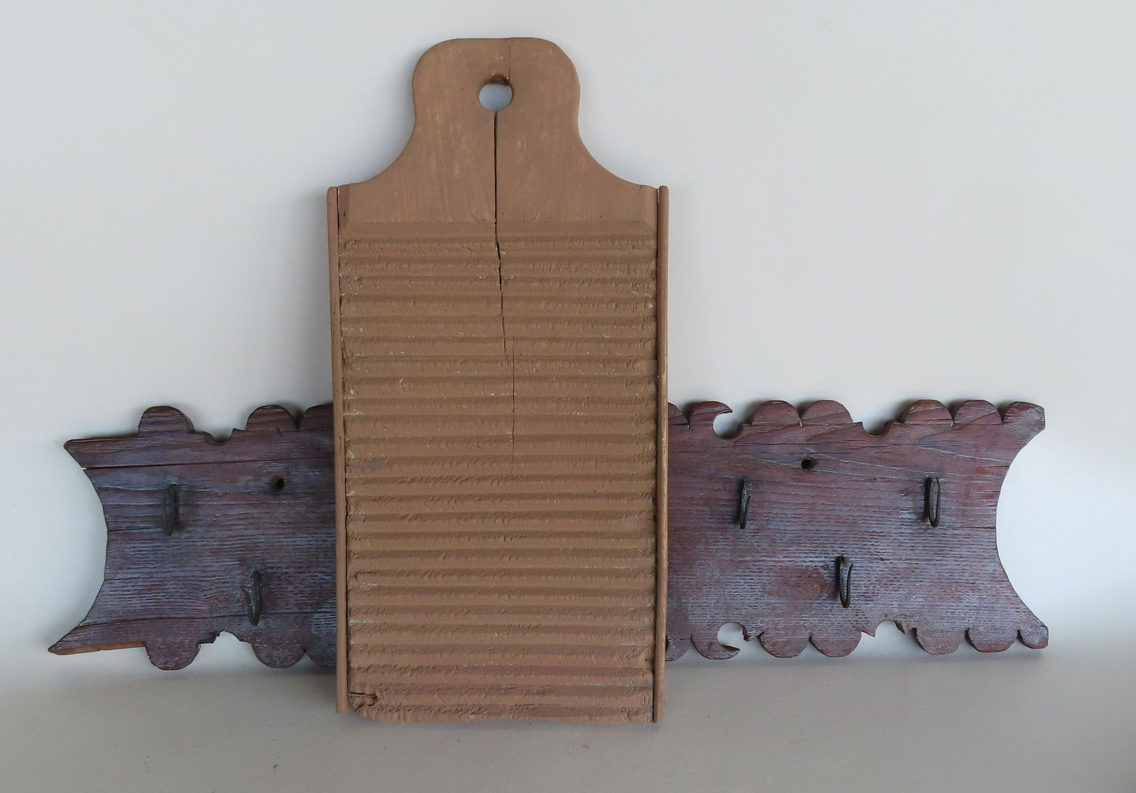 Two country farmhouse primitives. The first a game rack with hand forged iron hooks, 19th century - (1 of 11)