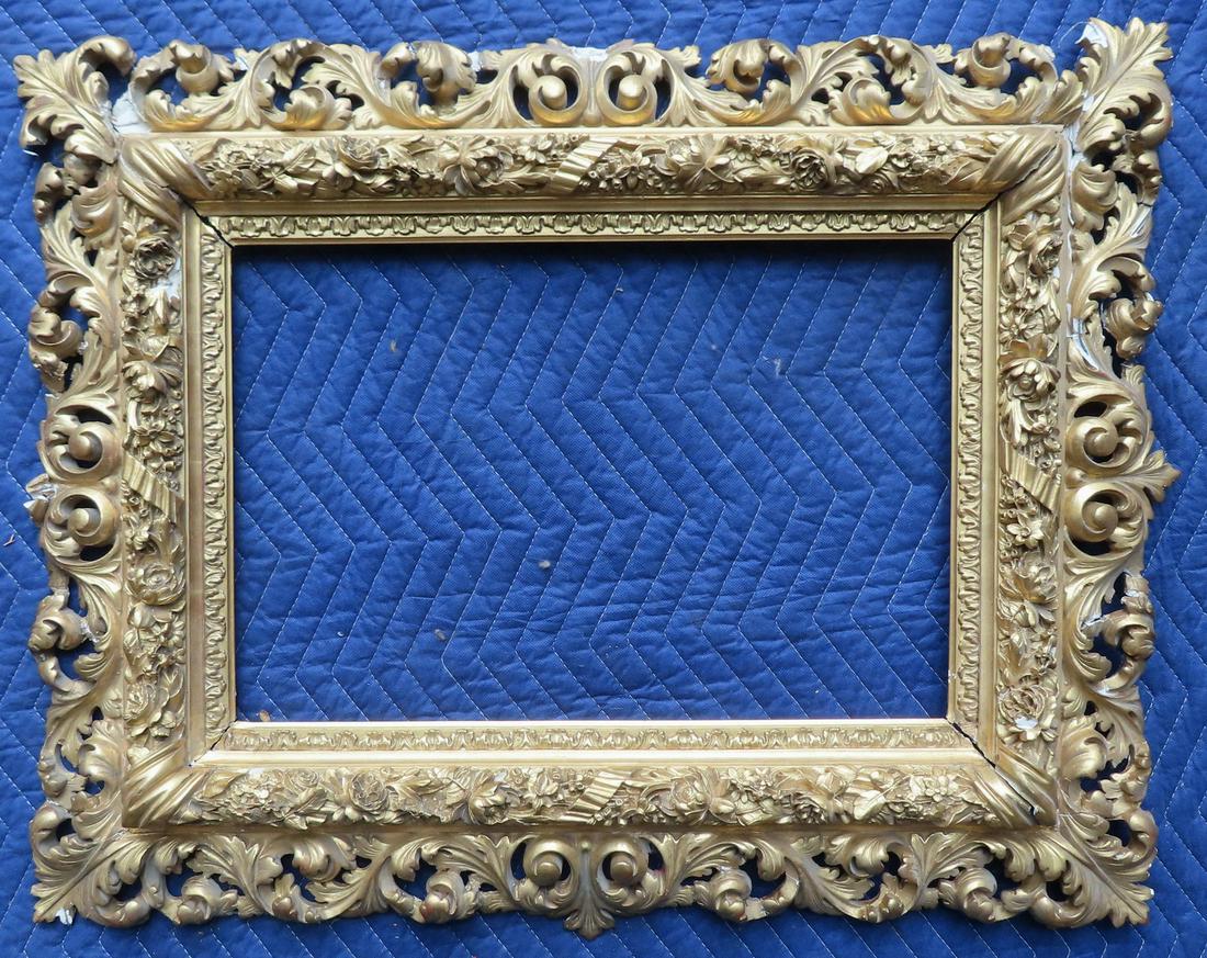 A very ornate gilt gesso wooden frame decorated with flowers, leaves and scrolls,  in need of some (1 of 15)